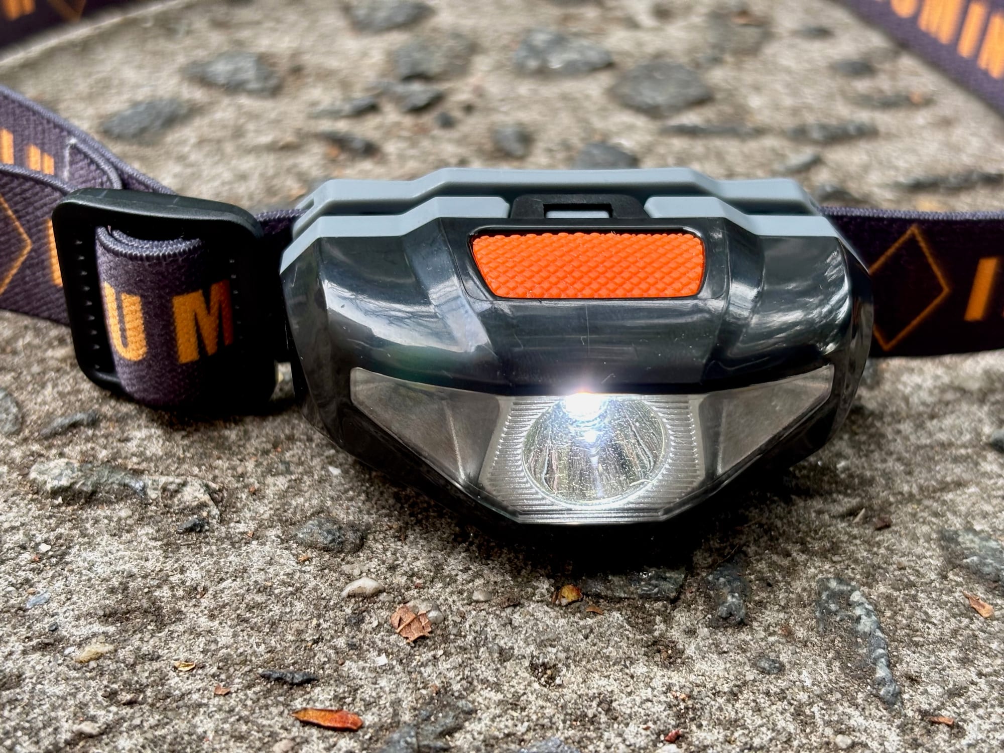 The Adventure Kings Illuminator LED head torch switched on