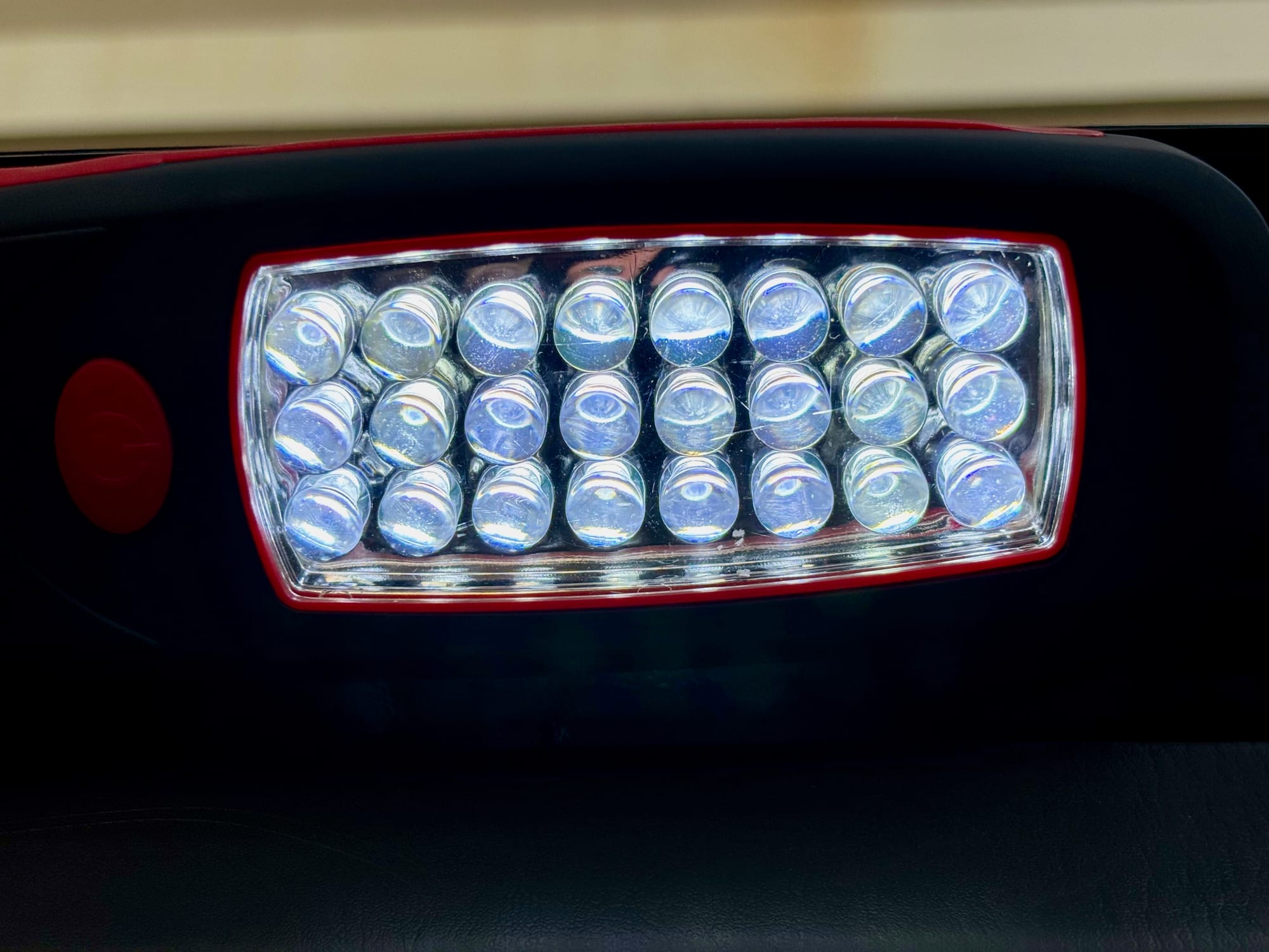 The 24 LEDs of the Adventure Kings Illuminator LED work light switched on