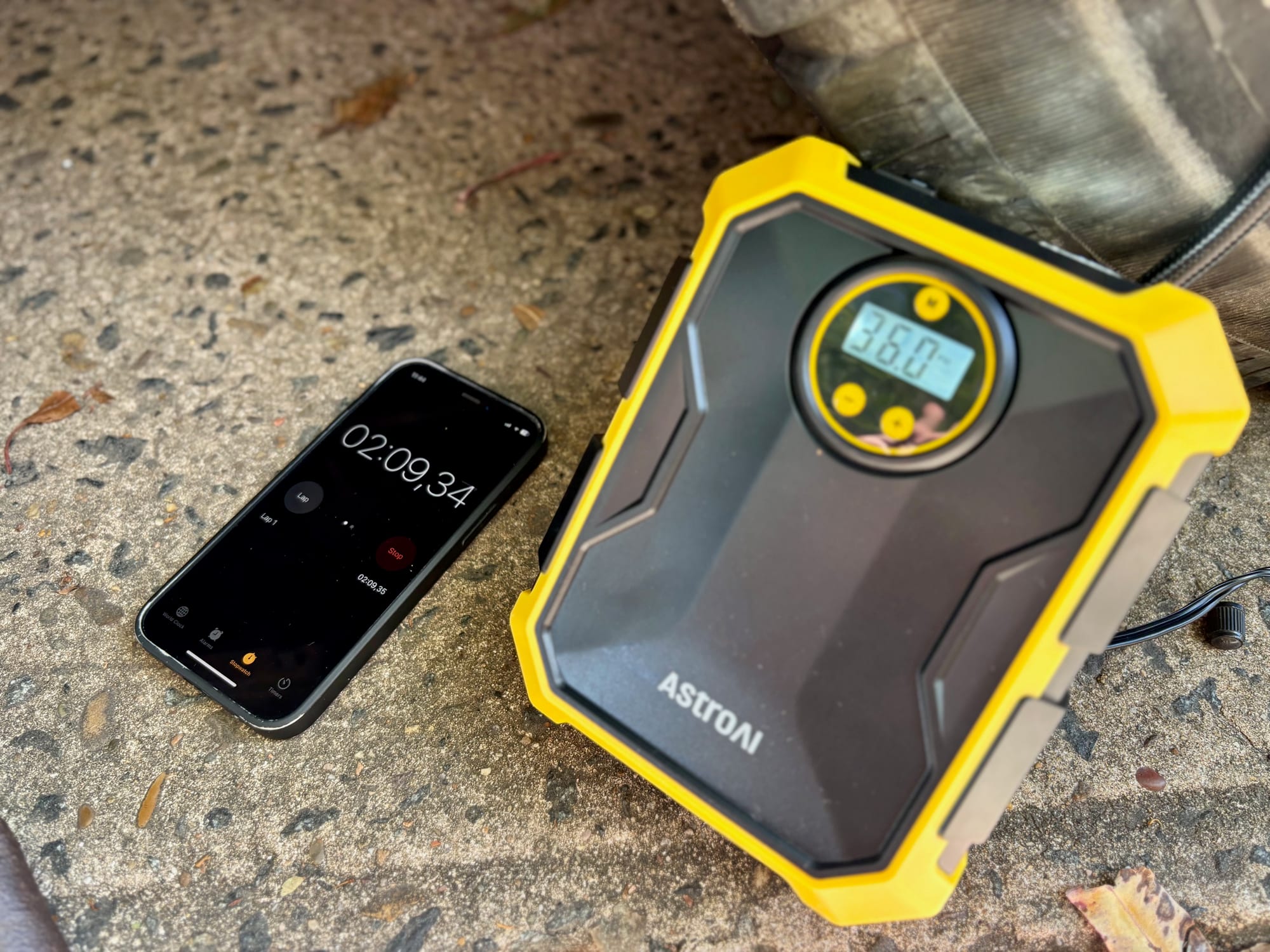 The AstroAI inflator at 36.0 PSI with the stopwatch at just over two minutes