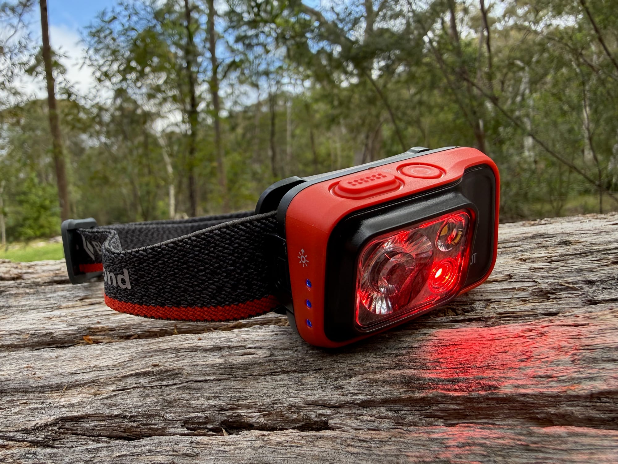 The Spot 400 with its red light on and the three blue battery meter lights lit on the side