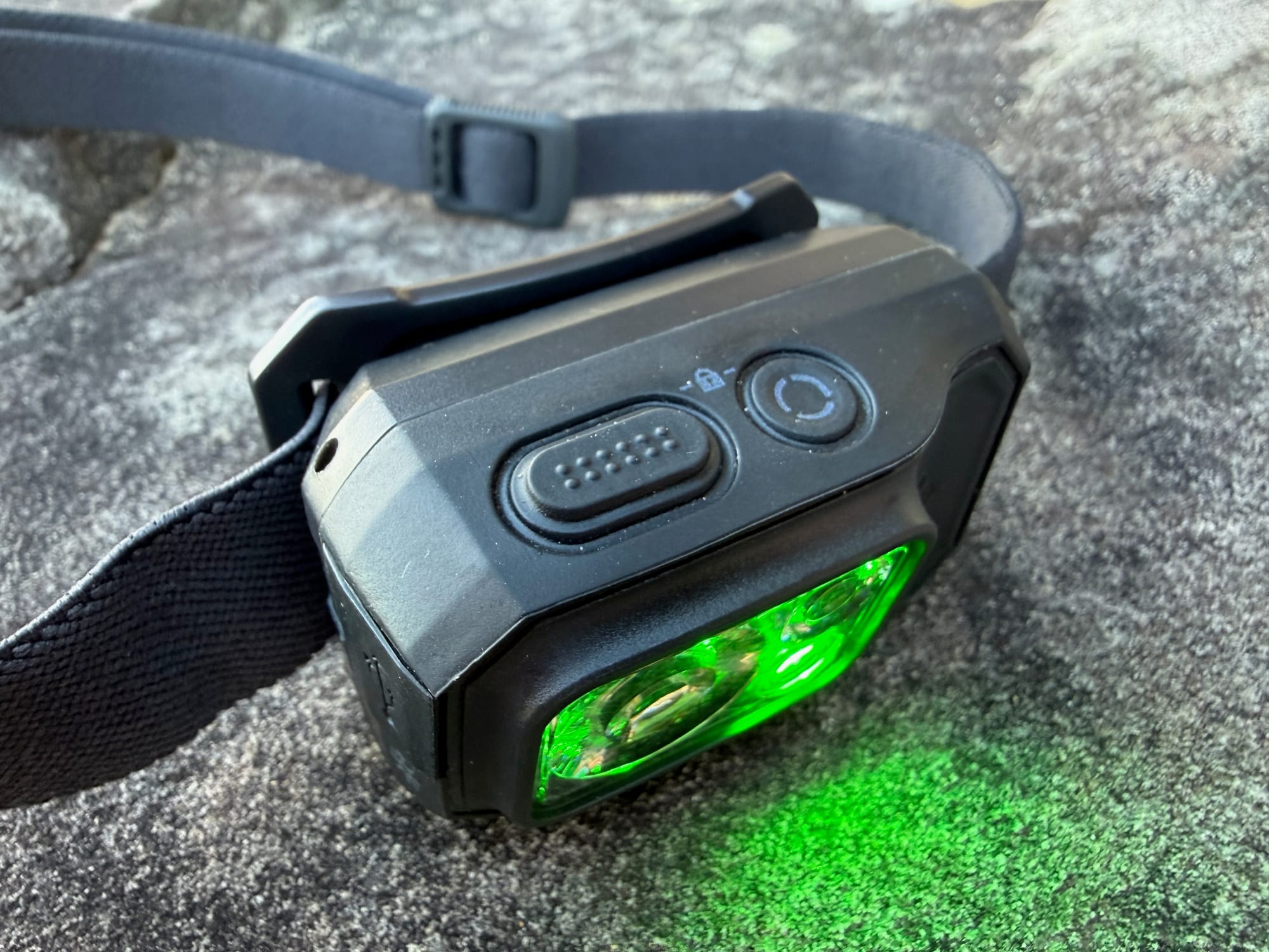 The two buttons on top of the Storm 500-R, with the green light on