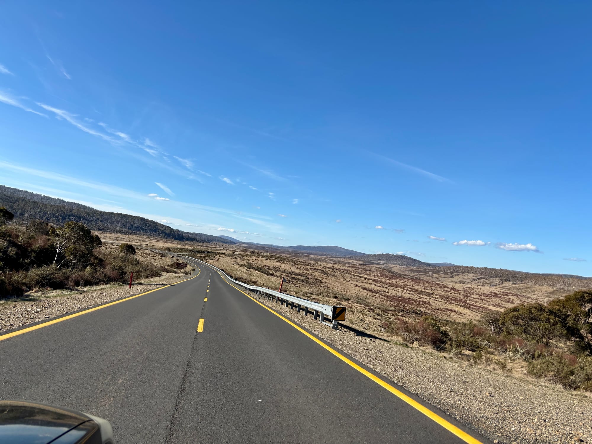 The Snowy Mountains Highway crossing open high plains north of Kiandra
