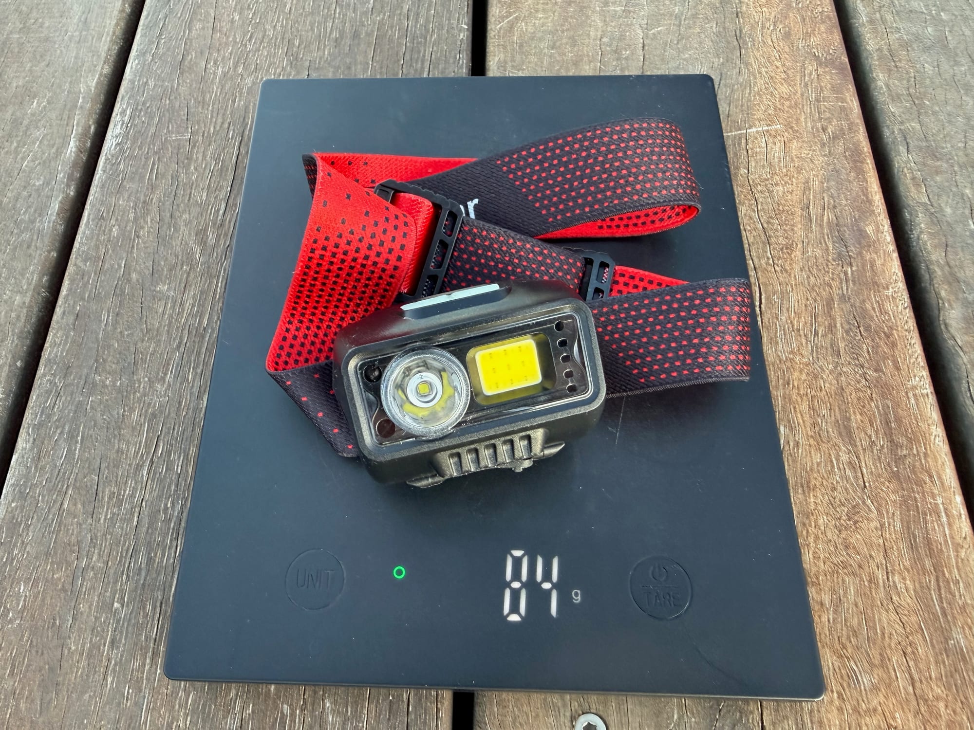 The Blukar K9111 headlamp on the scale at 84 g