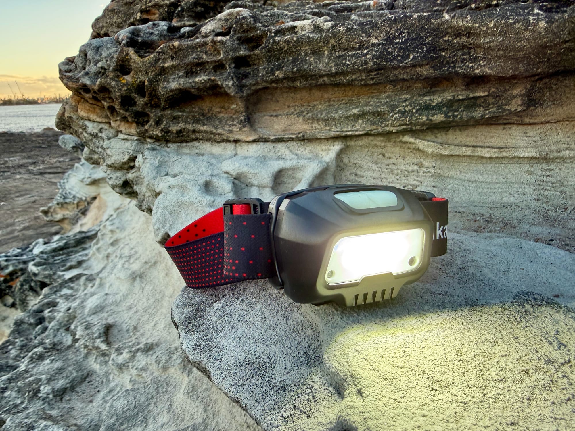 The white light of the Blukar K9112 headlamp switched on