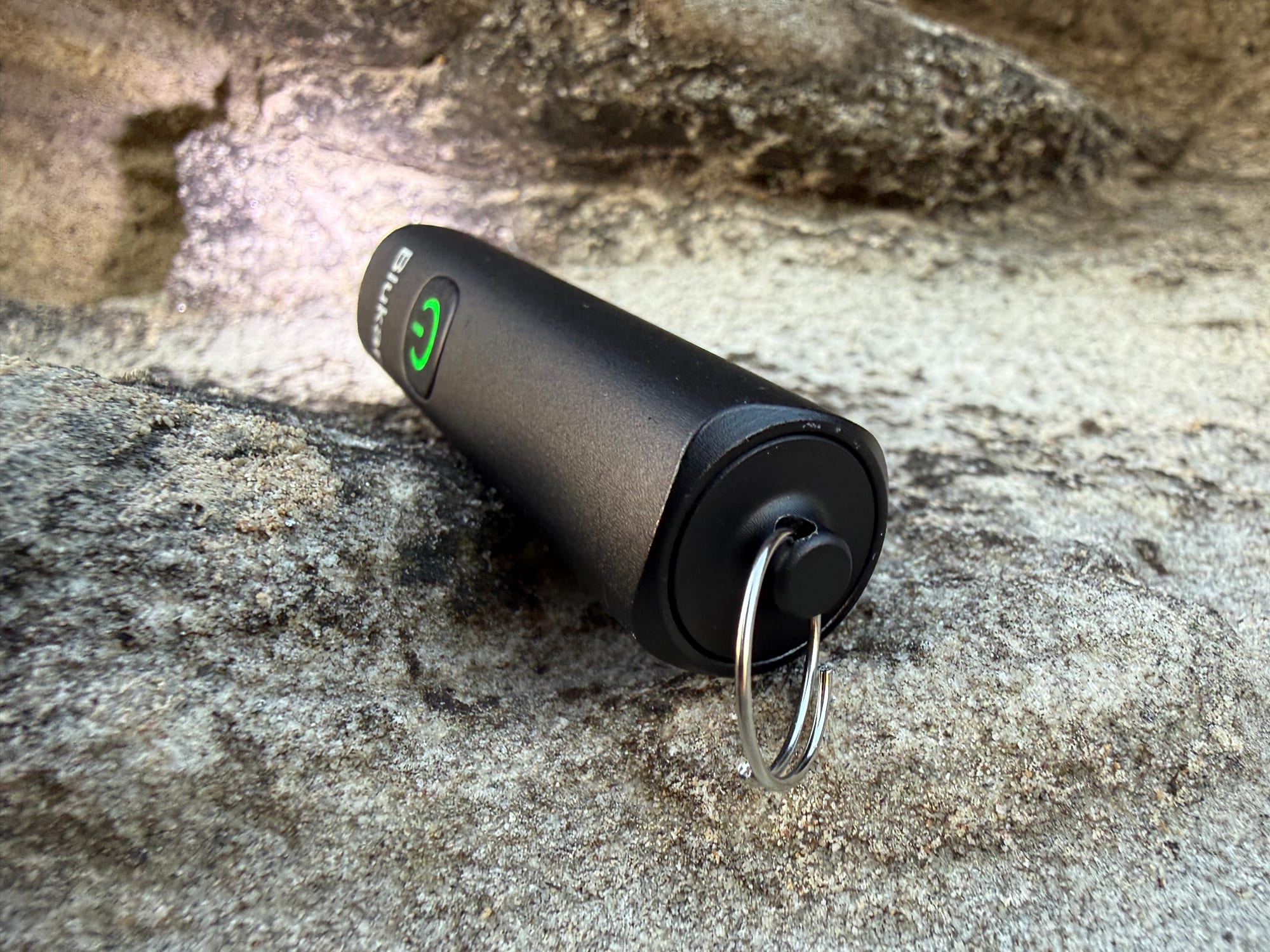 The tail of the Blukar Mini Torch with its key ring