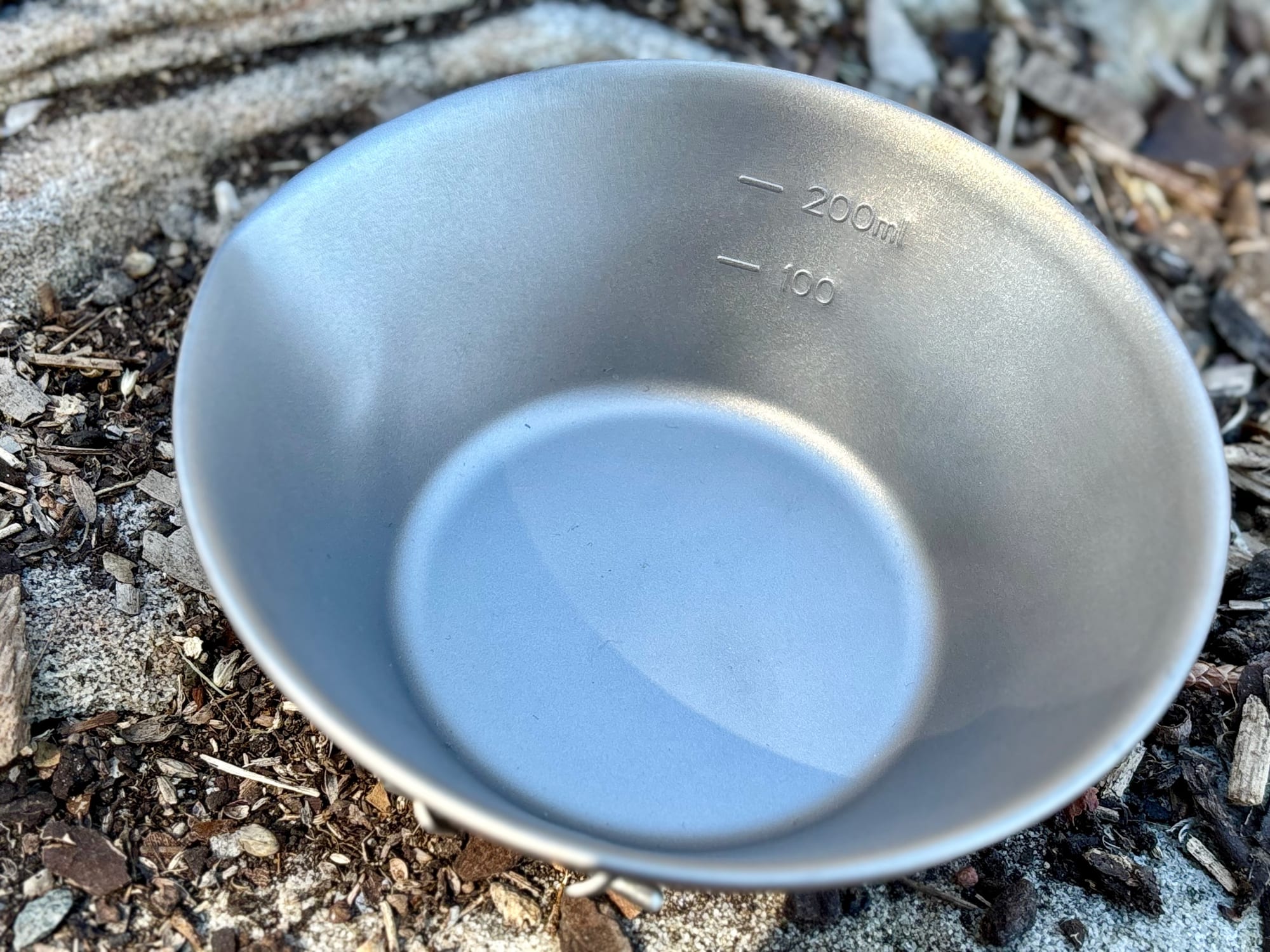 Inside the 300 ml titanium bowl, with the 100 and 200 ml marks near the rim