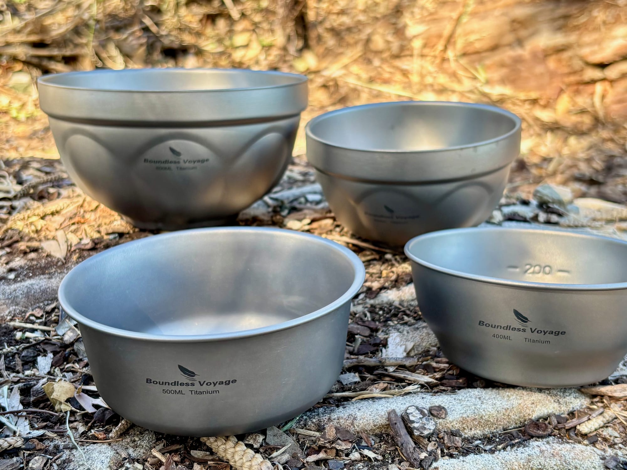 The 400 ml bowl with other Boundless Voyage titanium bowls, including the double-walled 500 ml and 800 ml