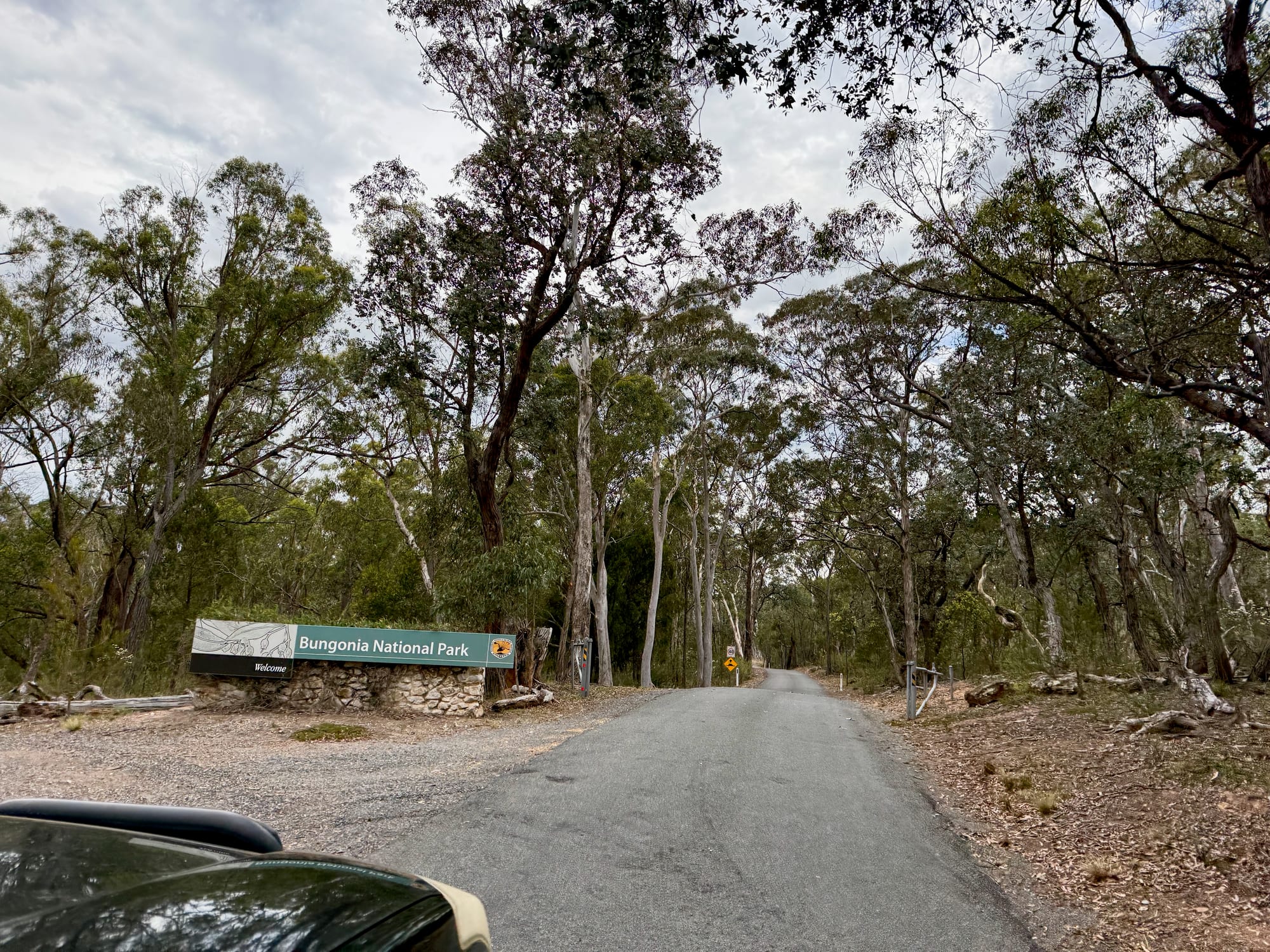 The entrance sign of Bungonia National Park beside the sealed road in