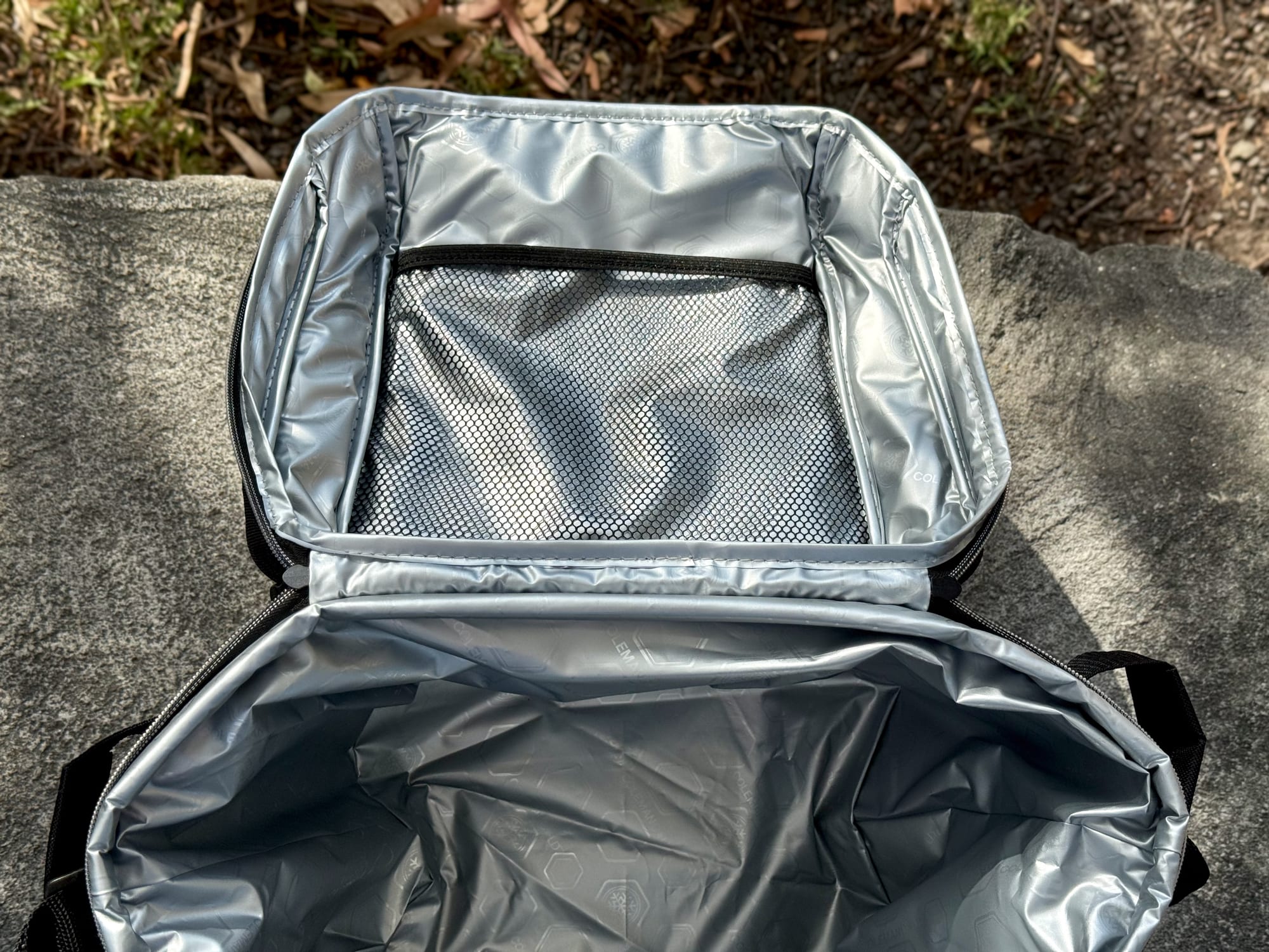 The silver lining and the mesh pocket in the lid of the Coleman 30 Can Soft Cooler