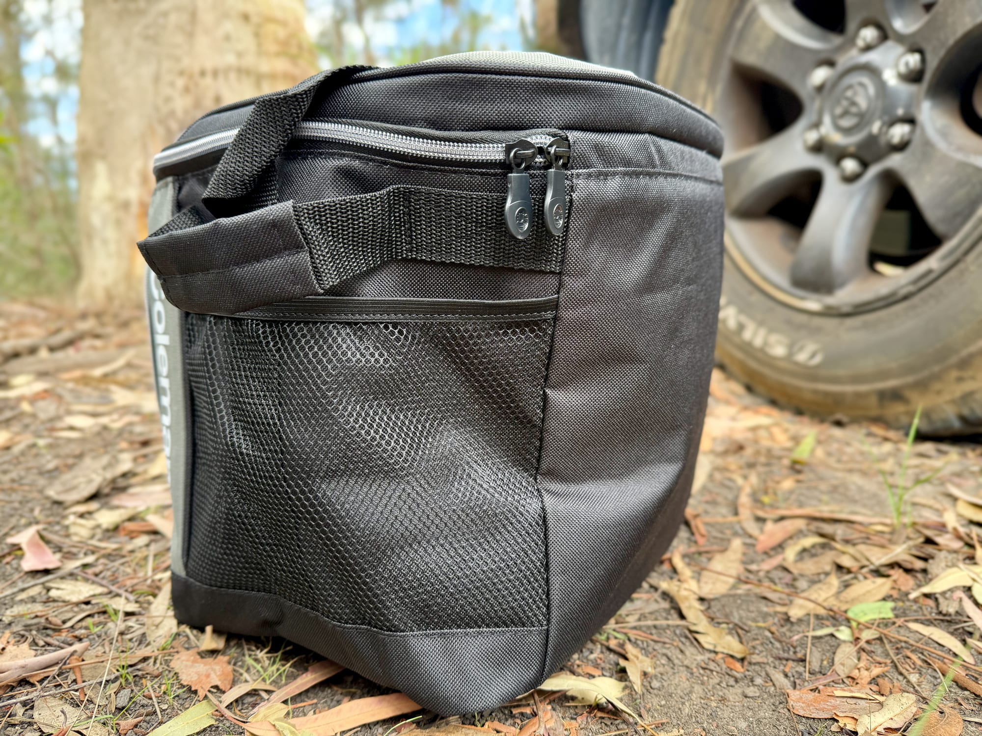 The mesh drink bottle holder on the side of the Coleman 30 Can Soft Cooler