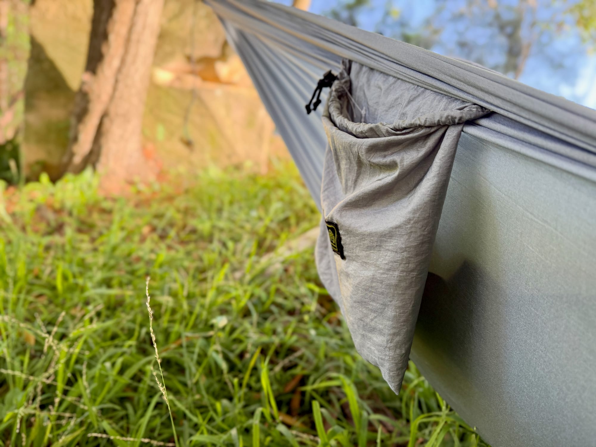 The attached storage pocket on the side of the Coleman hammock