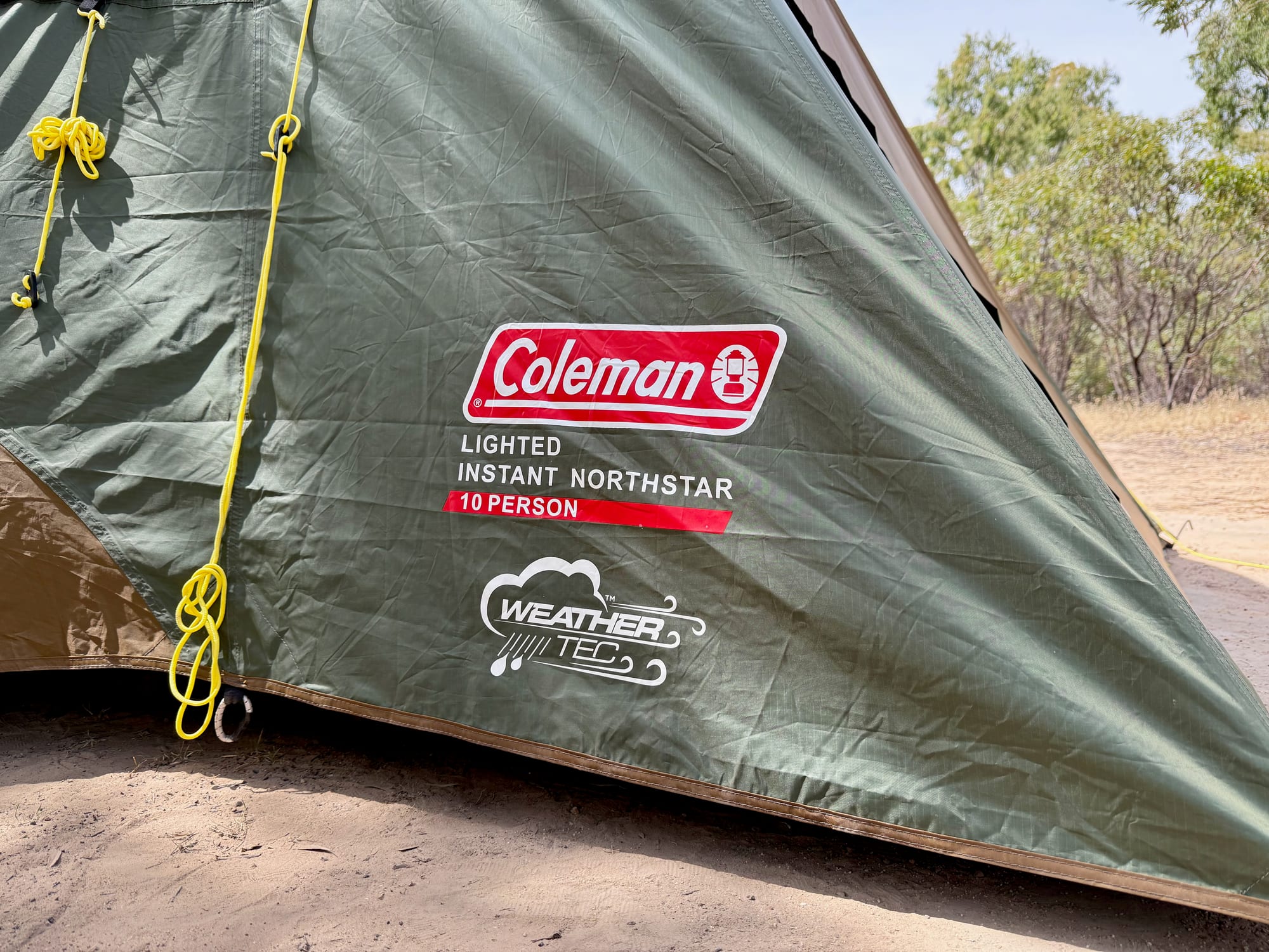 The label on the tent: Coleman Lighted Instant Northstar 10 Person, with the WeatherTec badge