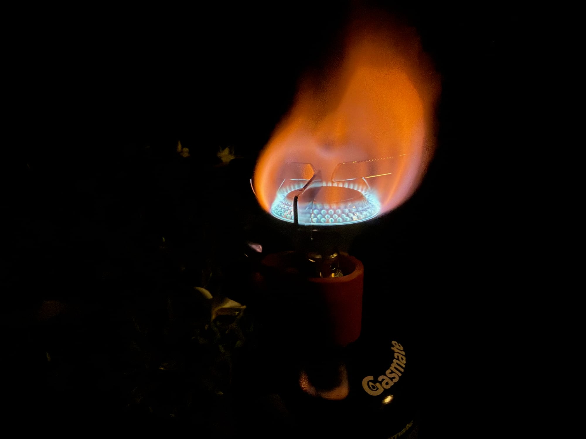 The Coleman Peak 1 at full flame at night