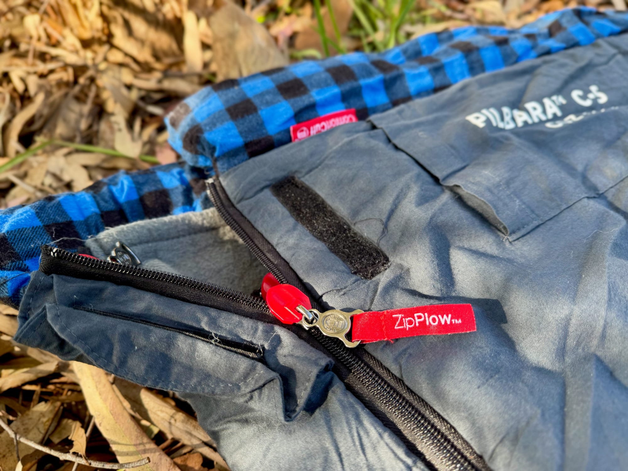 The red ZipPlow slider on the zip of the Coleman Pilbara C-5