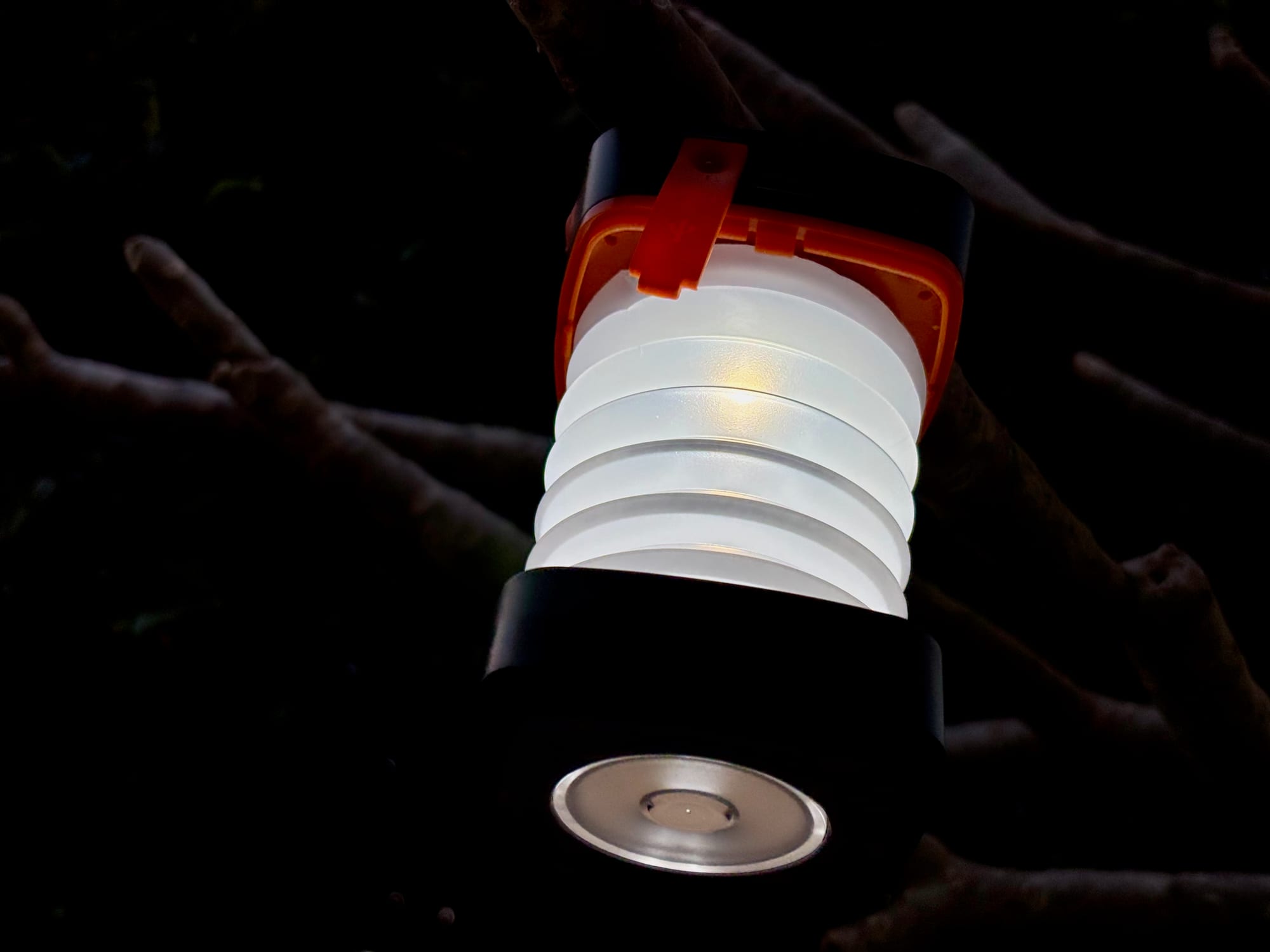 The solar lantern pulled out and glowing at night