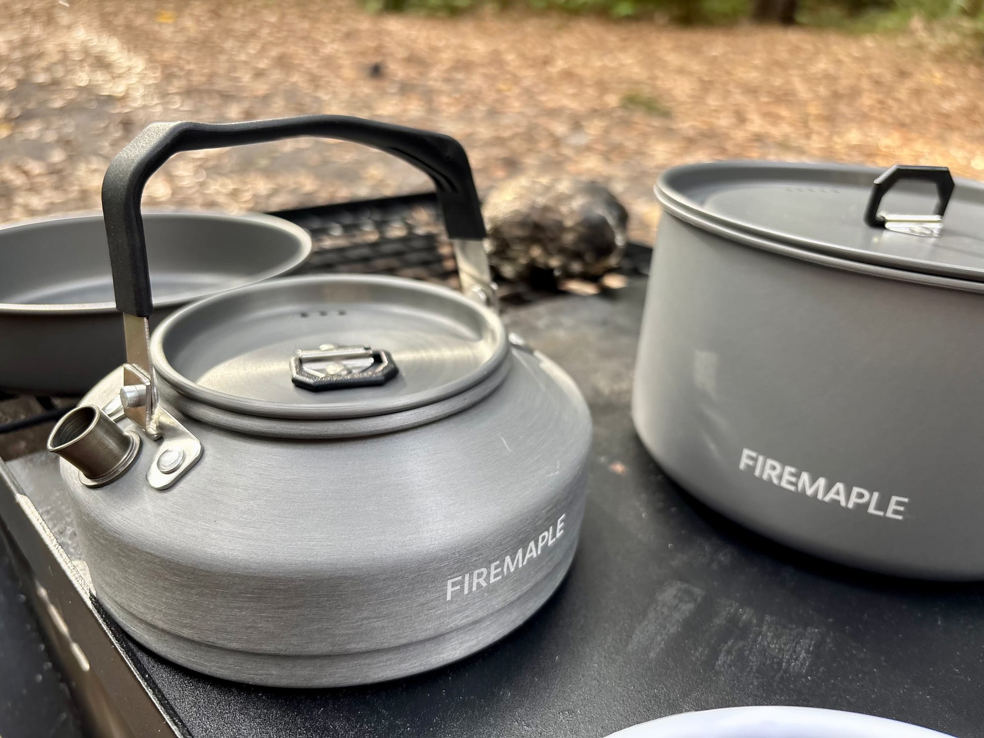 The Firemaple T3 kettle next to the pot