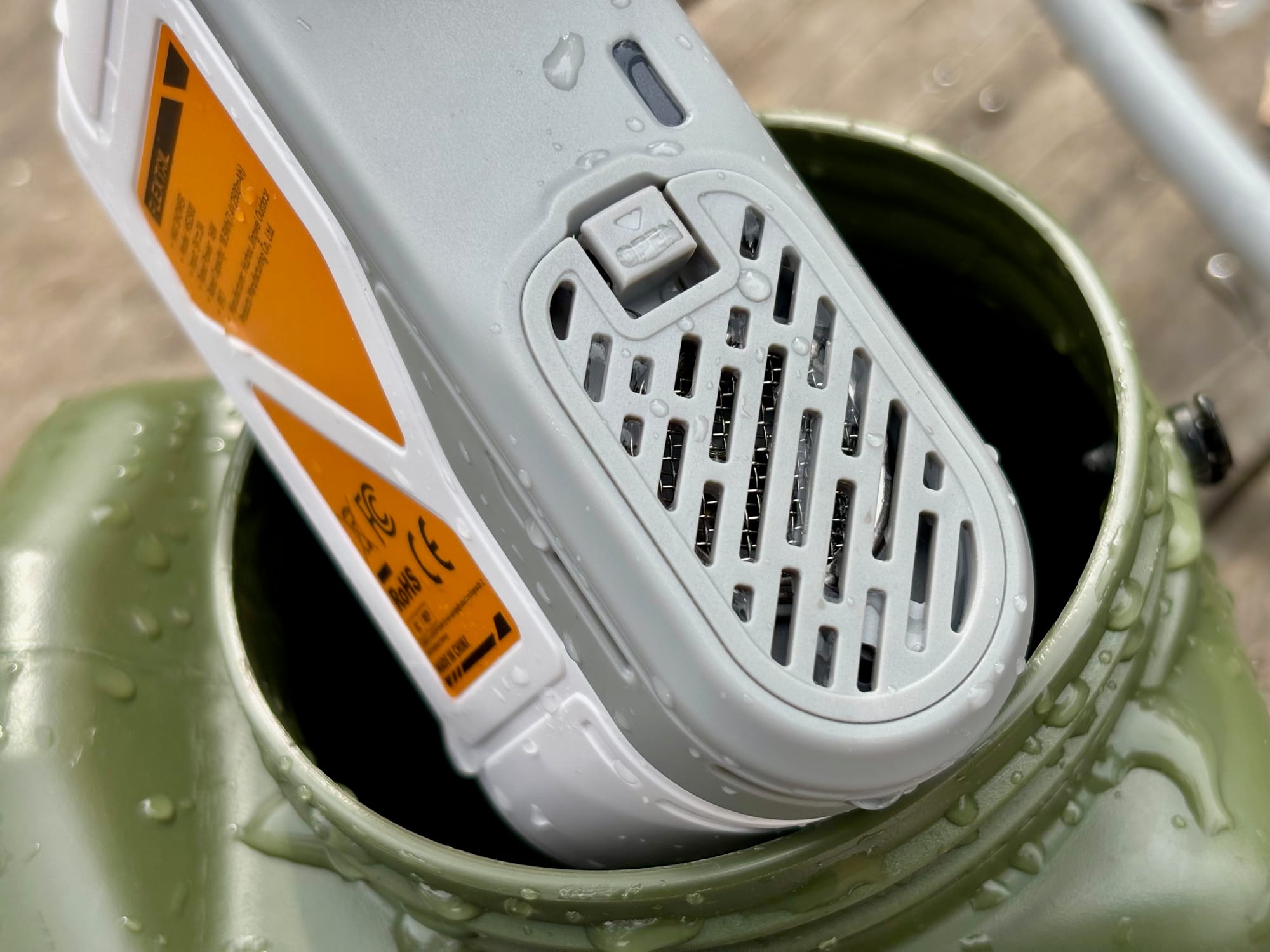 The intake grille with the metal filter on the end of the FlexTail Max Shower pump