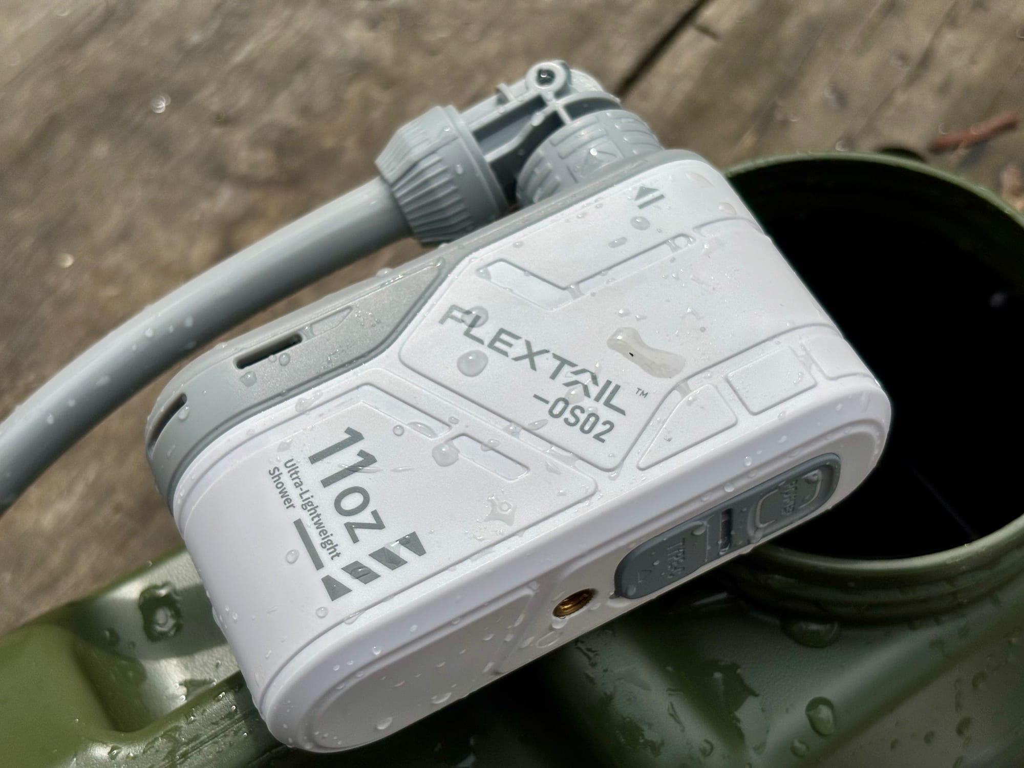 The power button and Type-C port cover on the end of the FlexTail Max Shower pump