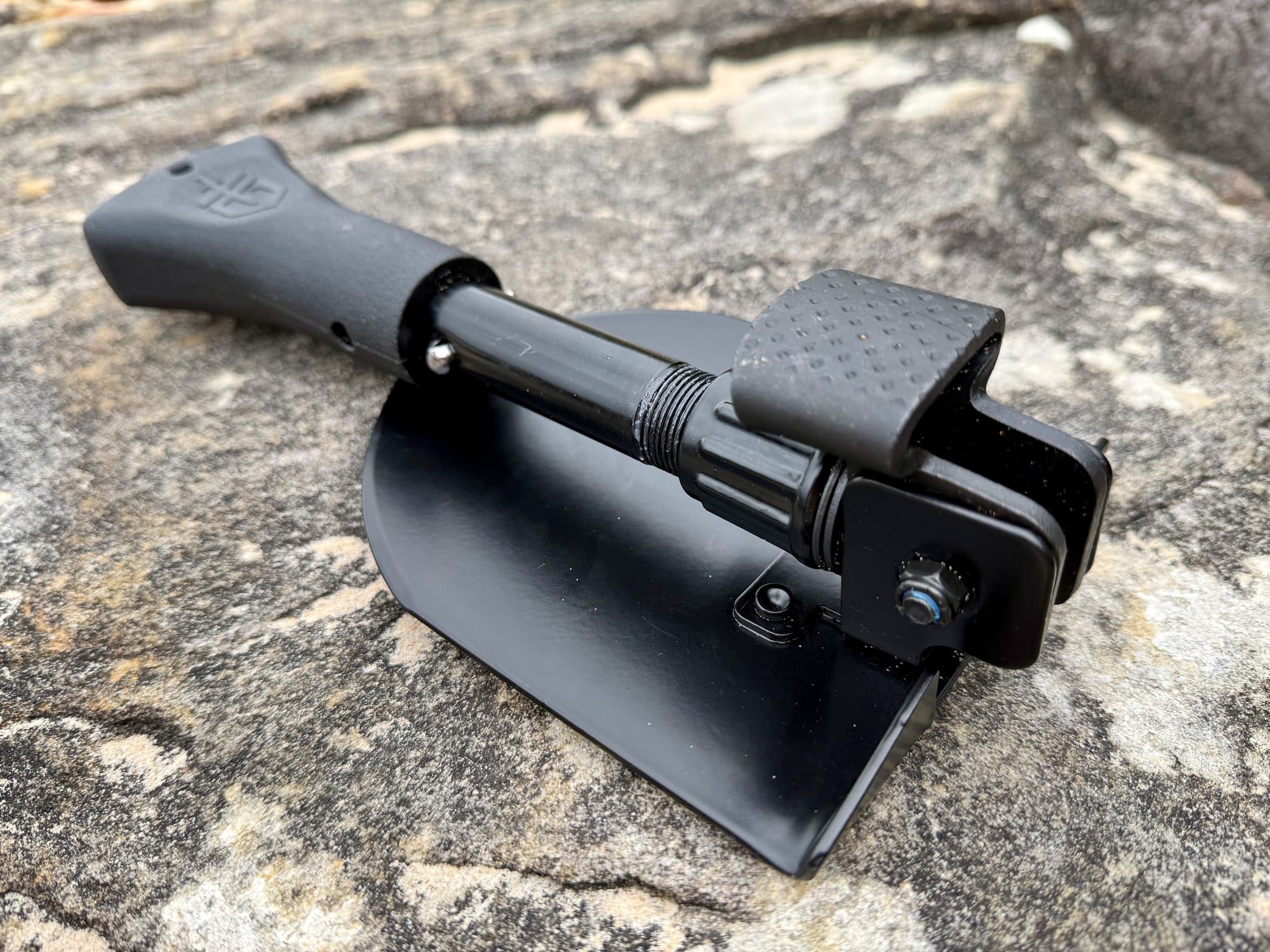 The folded Gerber Gorge shovel seen from above, with the textured hammer block at the base of the handle