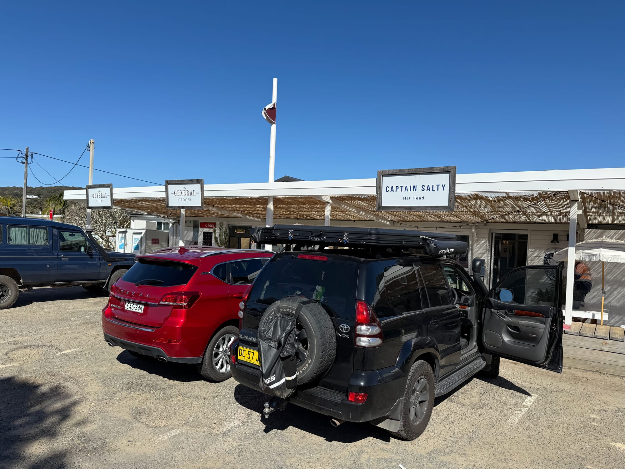 Our Prado parked in front of the Captain Salty cafe in Hat Head village