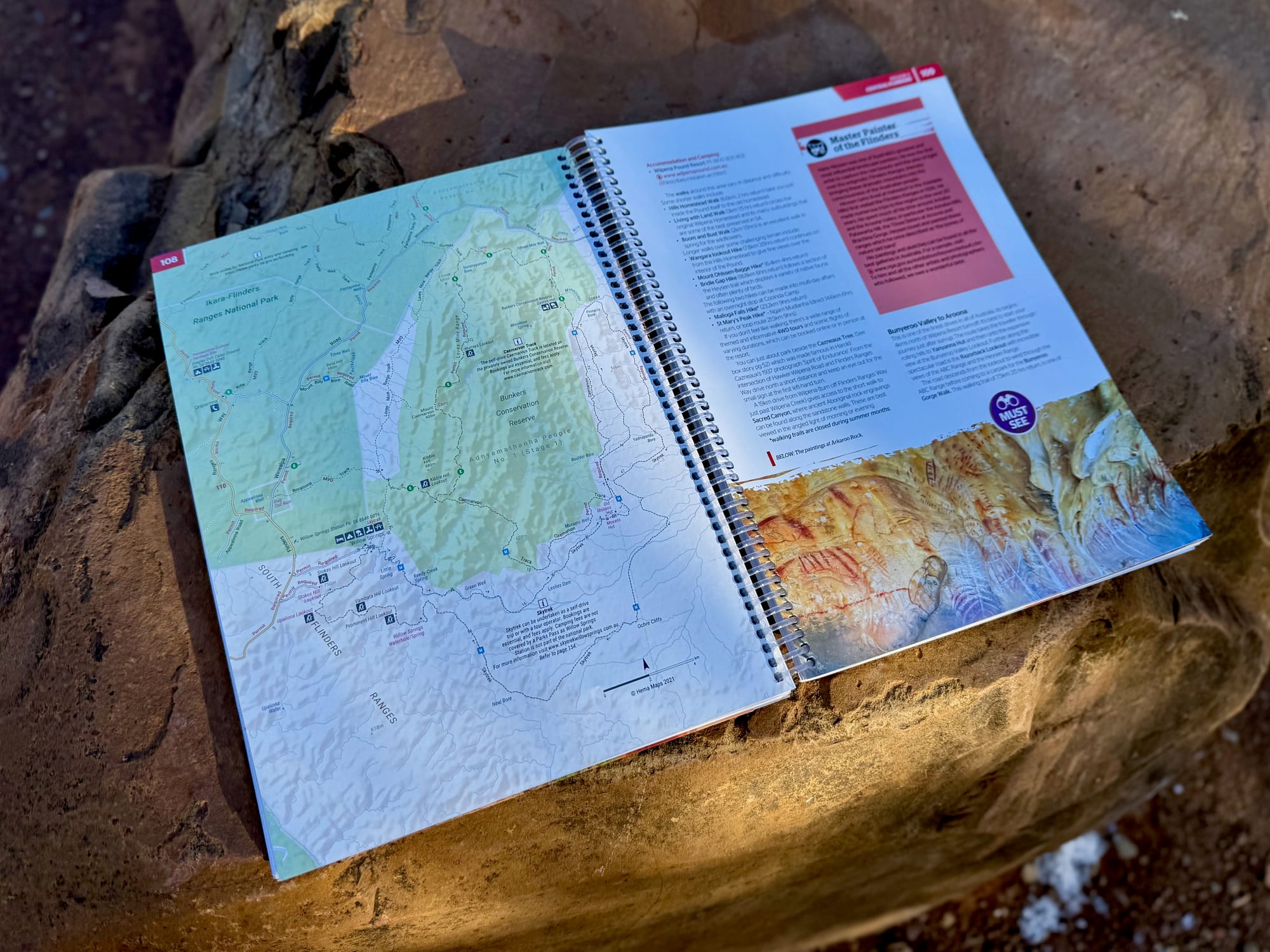 A map page next to a guide page in the Hema Flinders Ranges Atlas & Guide