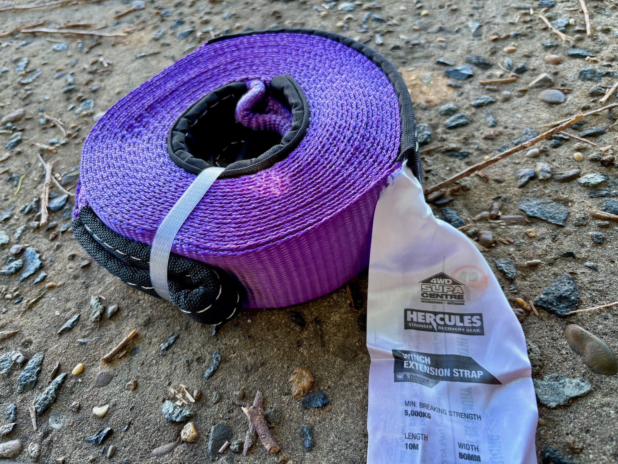 The purple Hercules winch extension strap with its label: 5,000 kg, 10 m, 50 mm