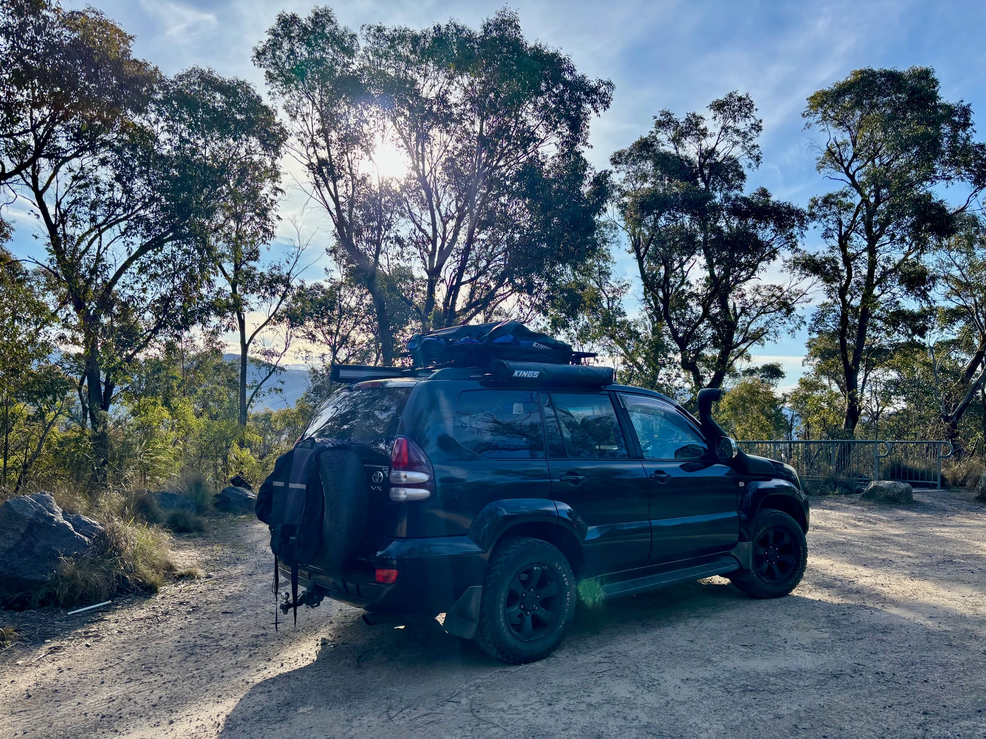 Our Prado in the gravel car park at Hospital Hill Lookout, with the viewing deck behind it
