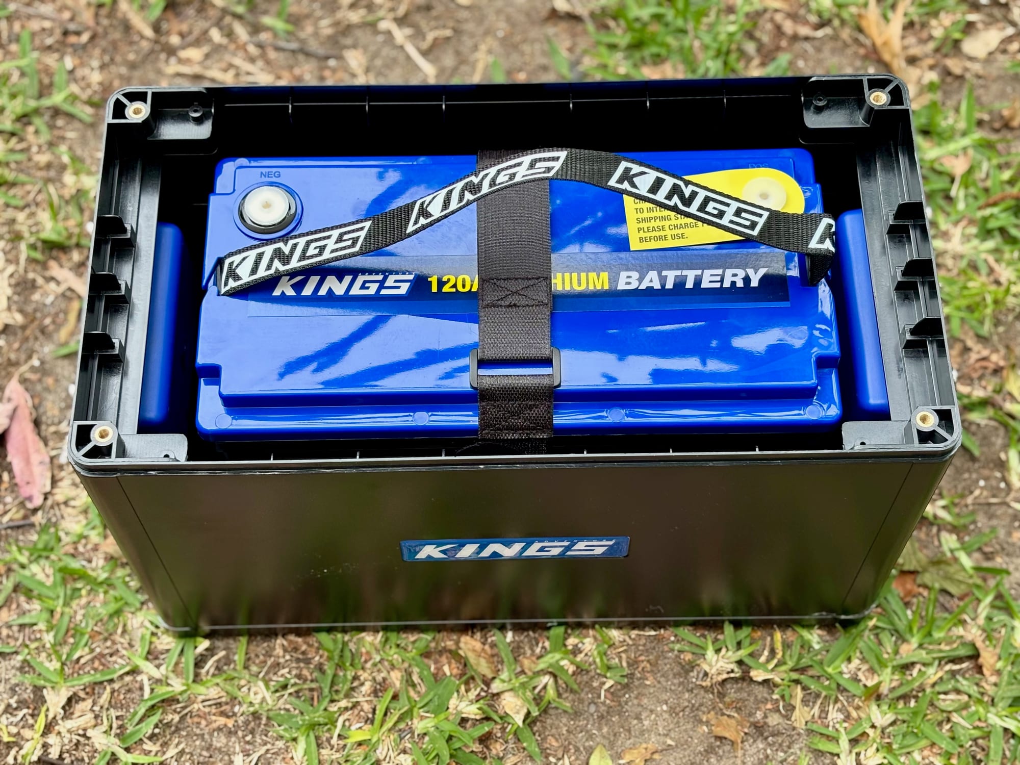 The Kings 120Ah lithium battery sitting in the bottom half of the BatBlock 25