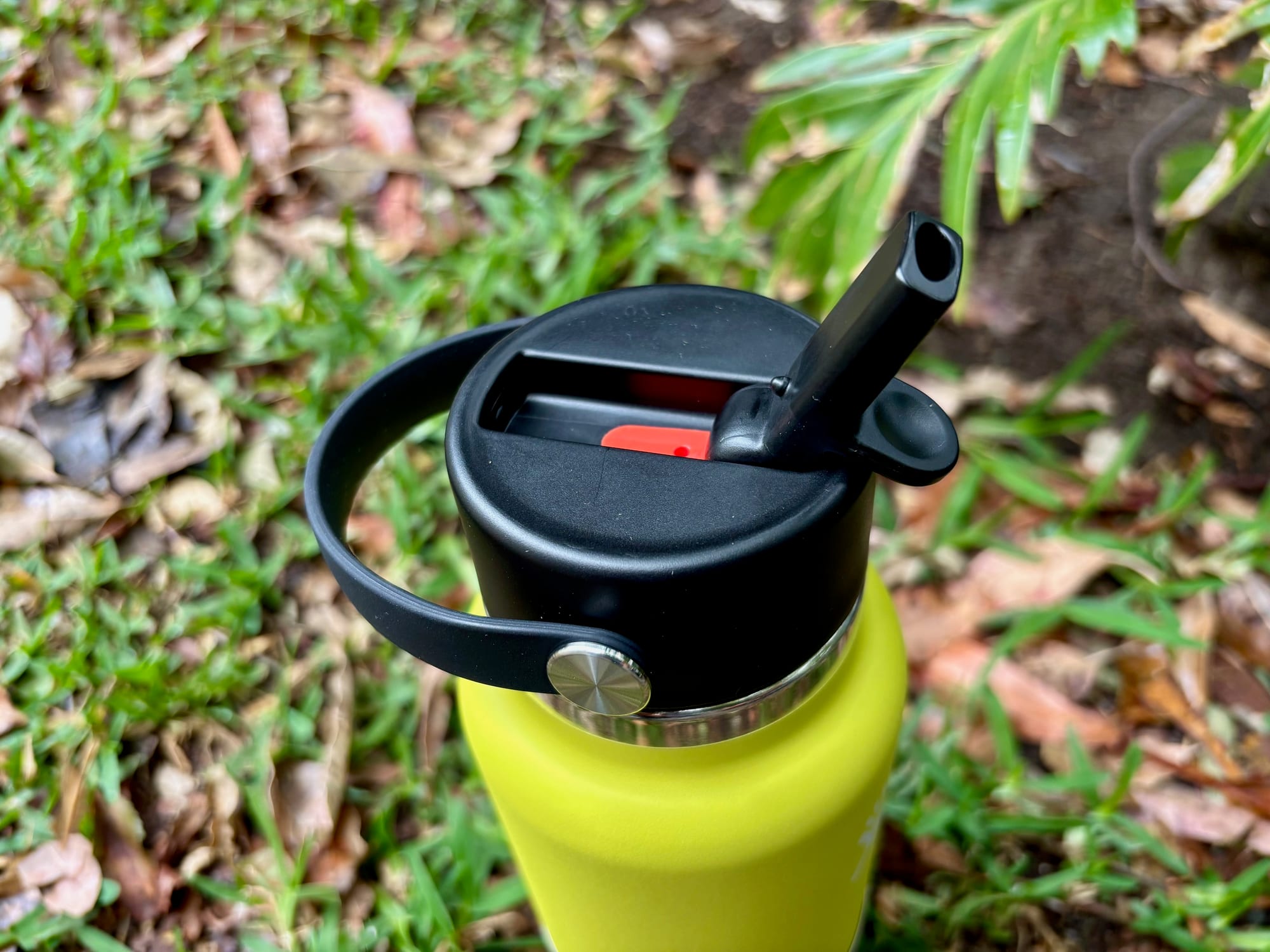The Hydro Flask with its straw flipped up, ready to drink