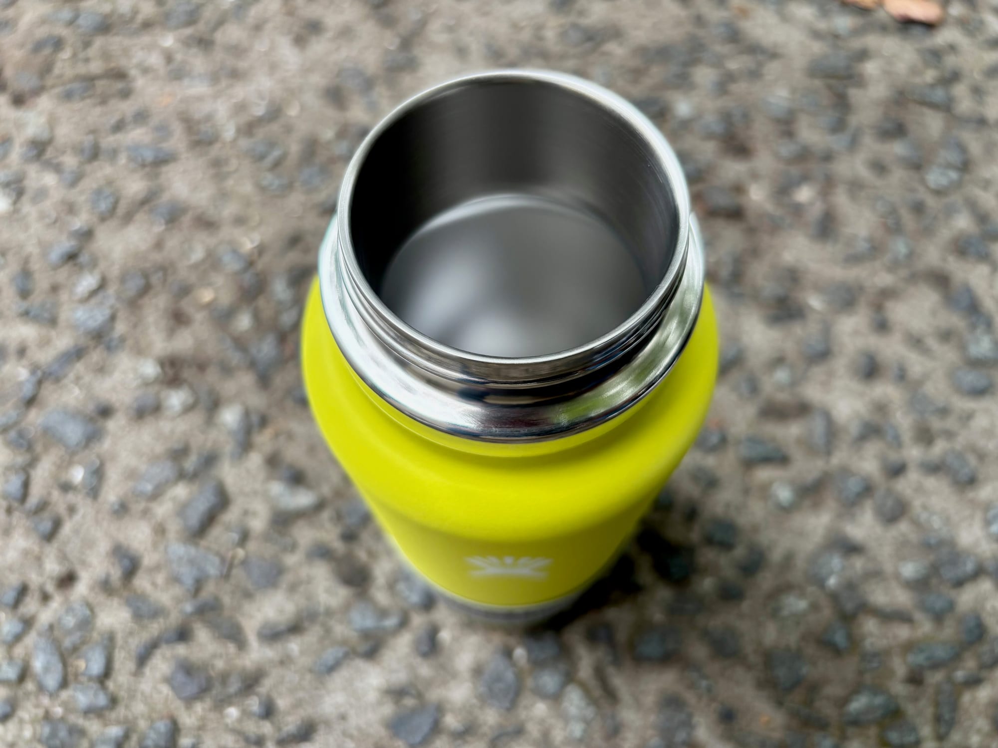 The wide stainless steel mouth of the Hydro Flask, seen from above