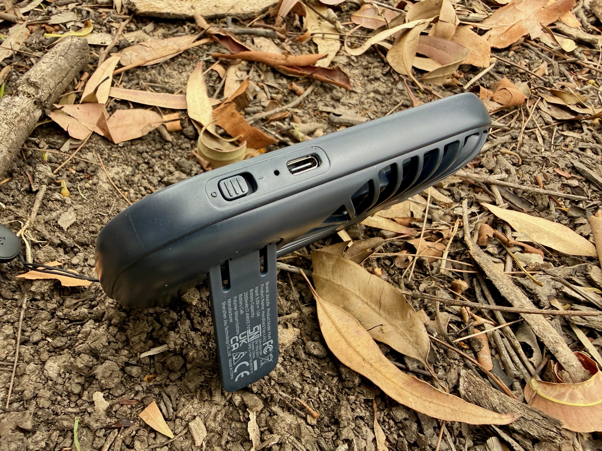 The JisuLife Life2 on its stand from the side, with the USB-C port and safety lock