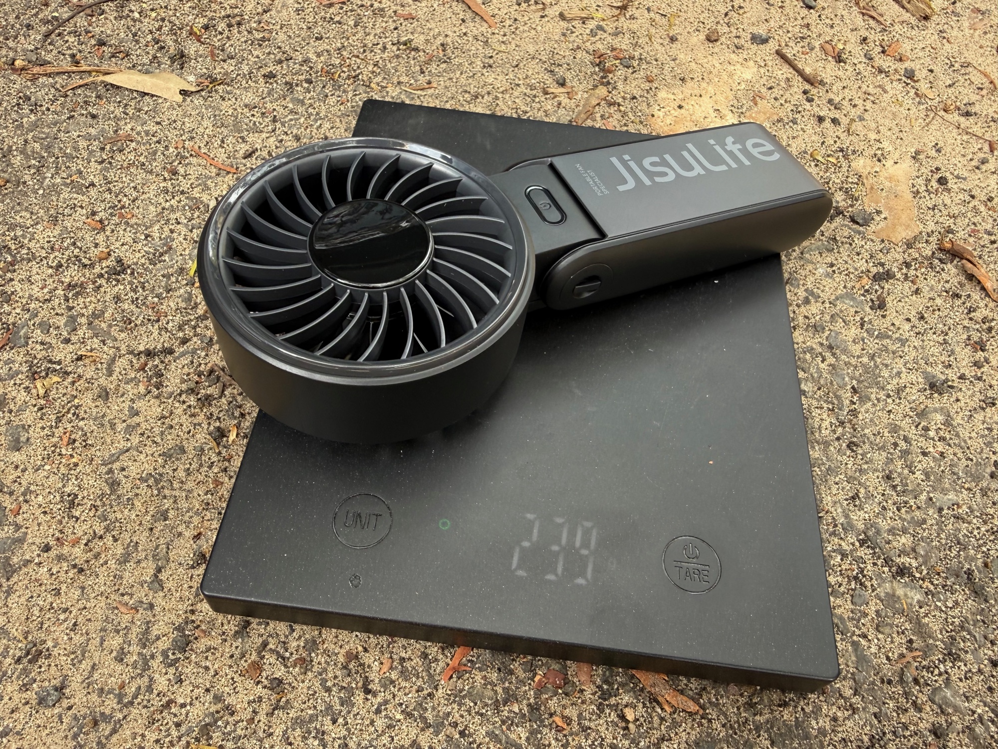 The JisuLife Life7 on a kitchen scale showing 239 g