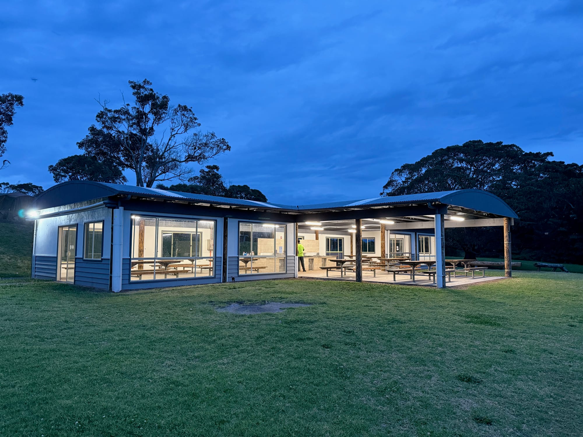The camp kitchen building at Killalea Campground with its covered area and picnic tables