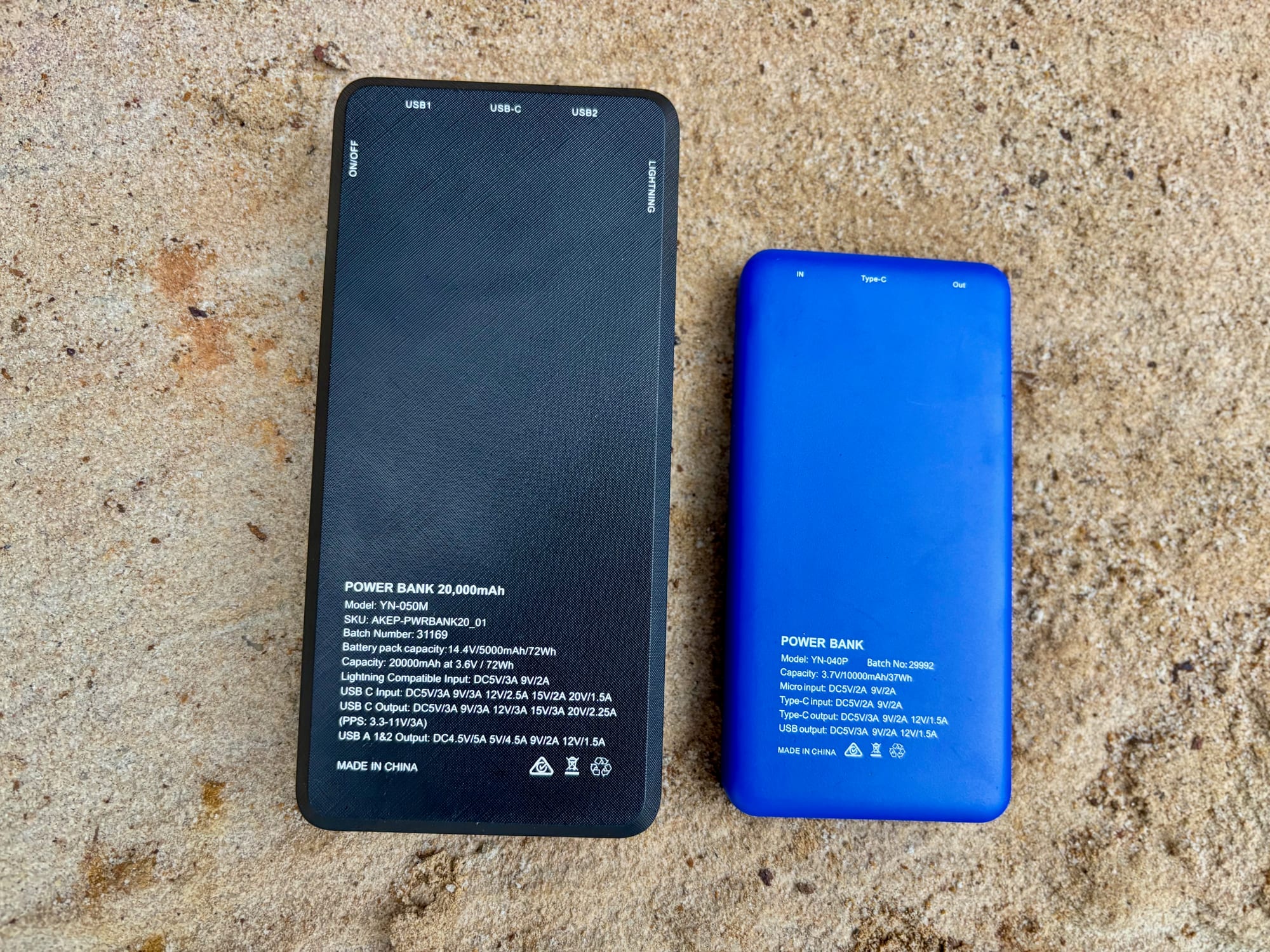 The spec labels on the back of the Kings 20,000mAh and the blue Kings 10,000mAh power banks