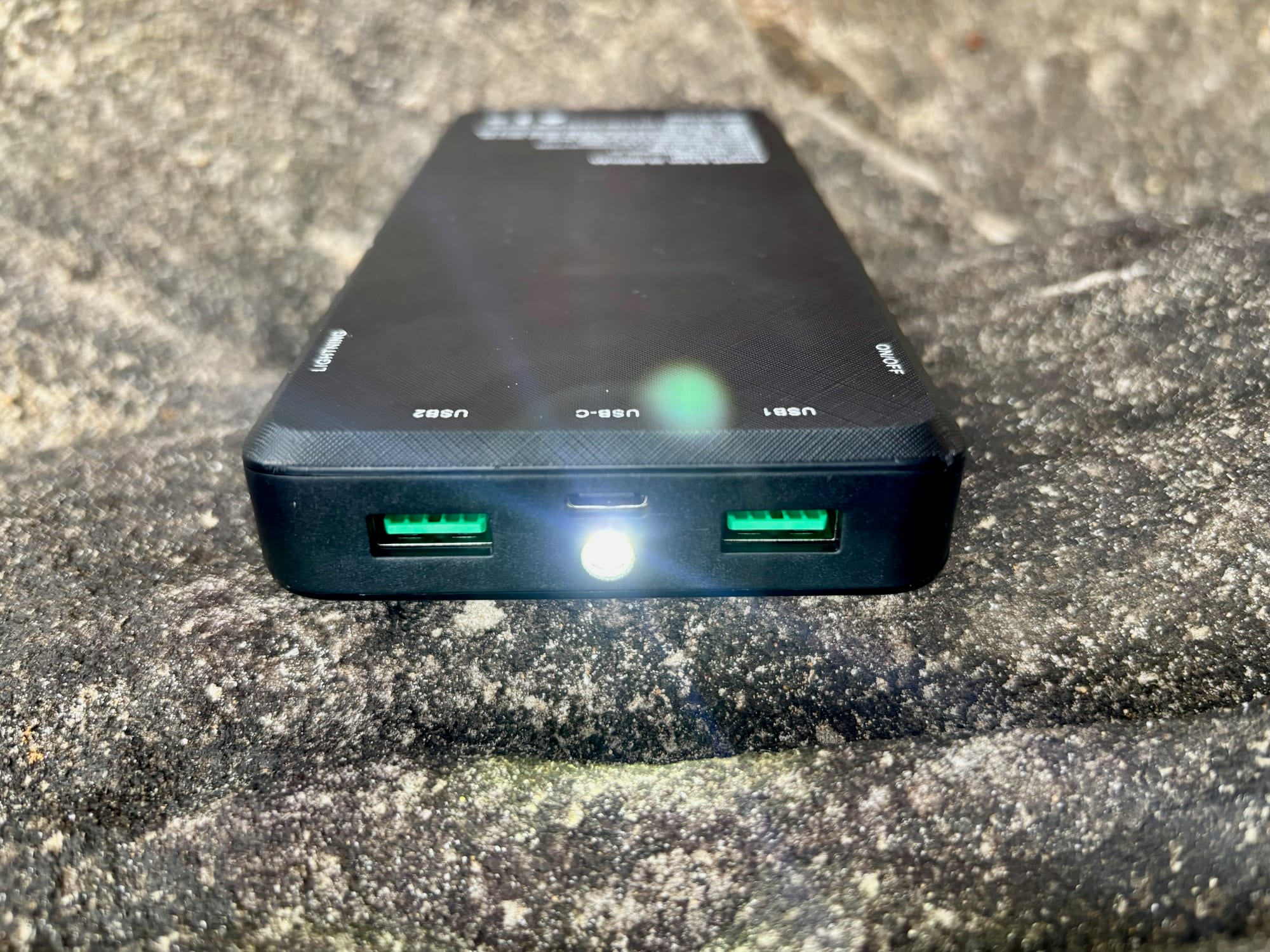 The built-in torch of the Kings 20,000mAh power bank switched on