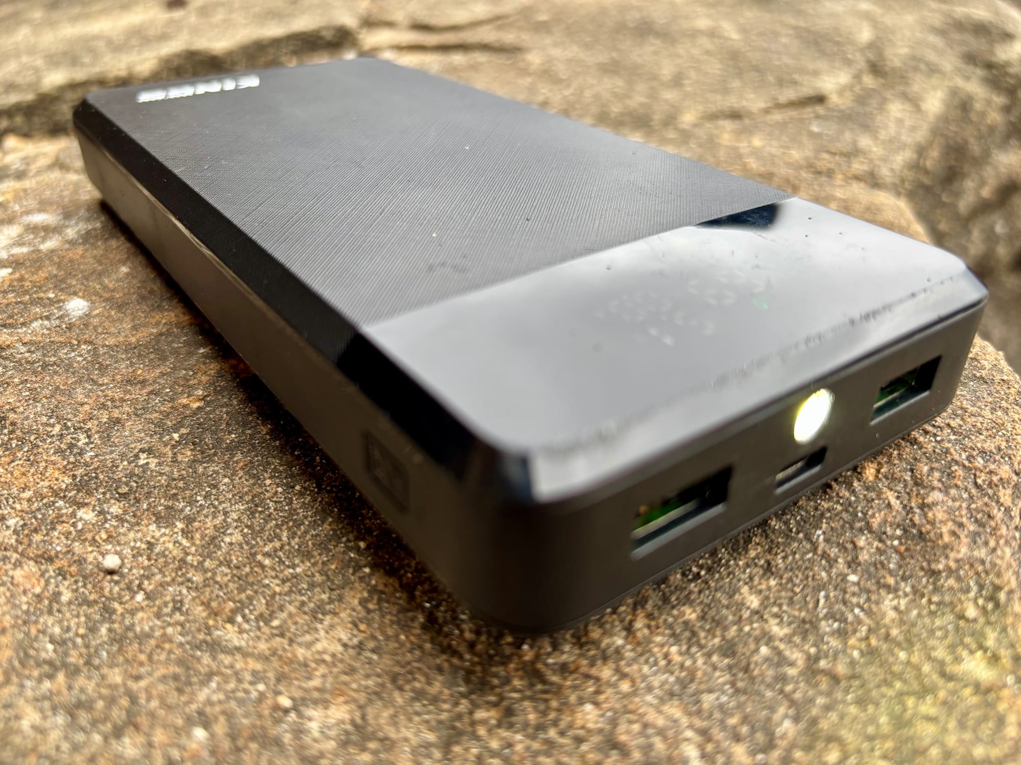 The USB ports and torch on the end of the Kings 20,000mAh power bank