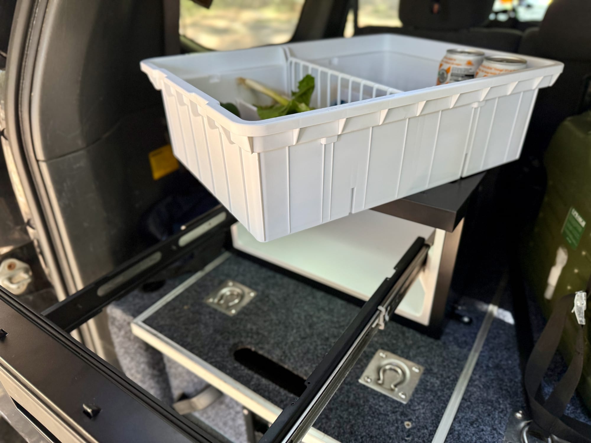 The white basket with dividers lifted out of the Kings drawer fridge