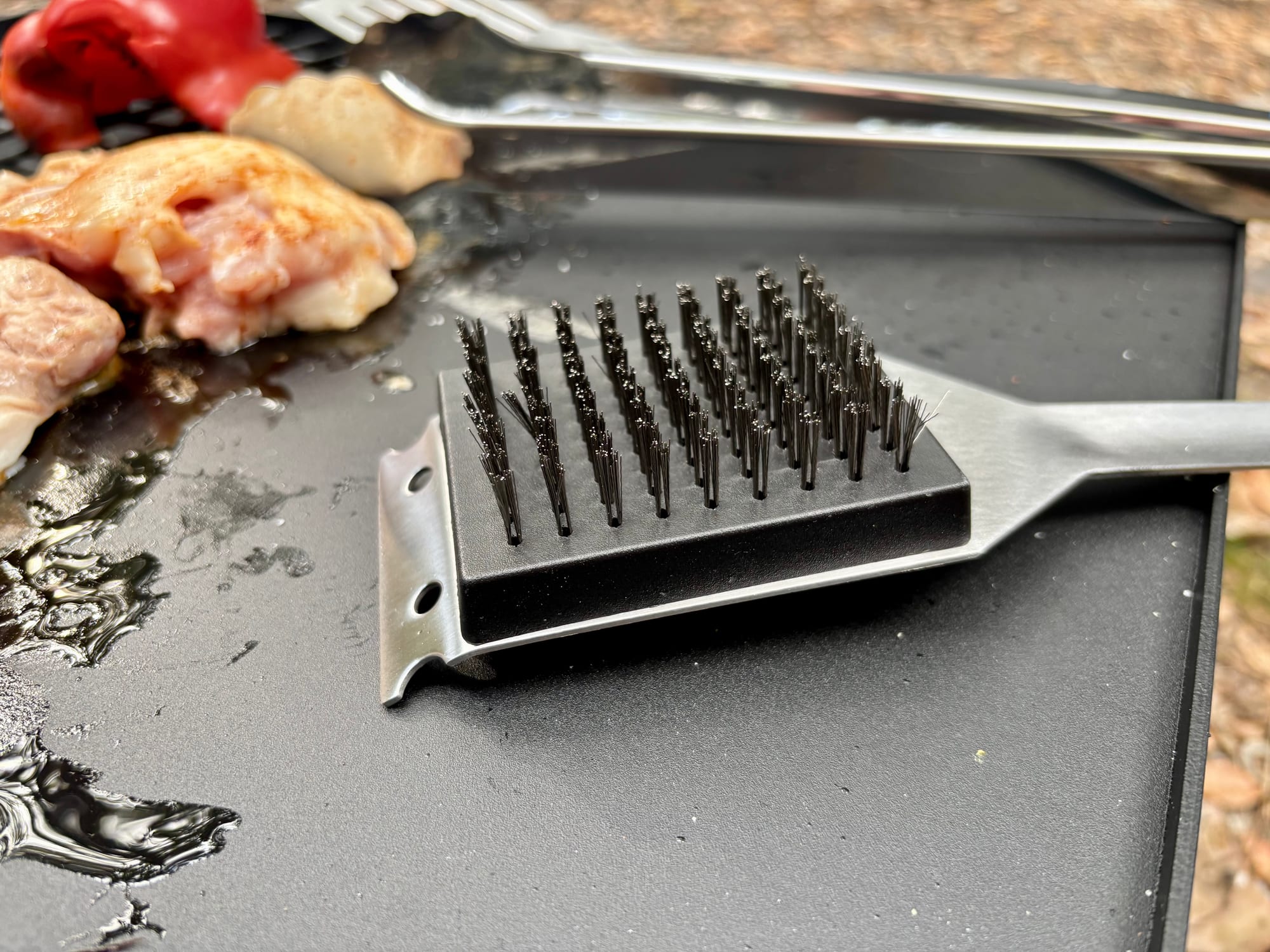The Kings scraper brush on the hotplate after cooking