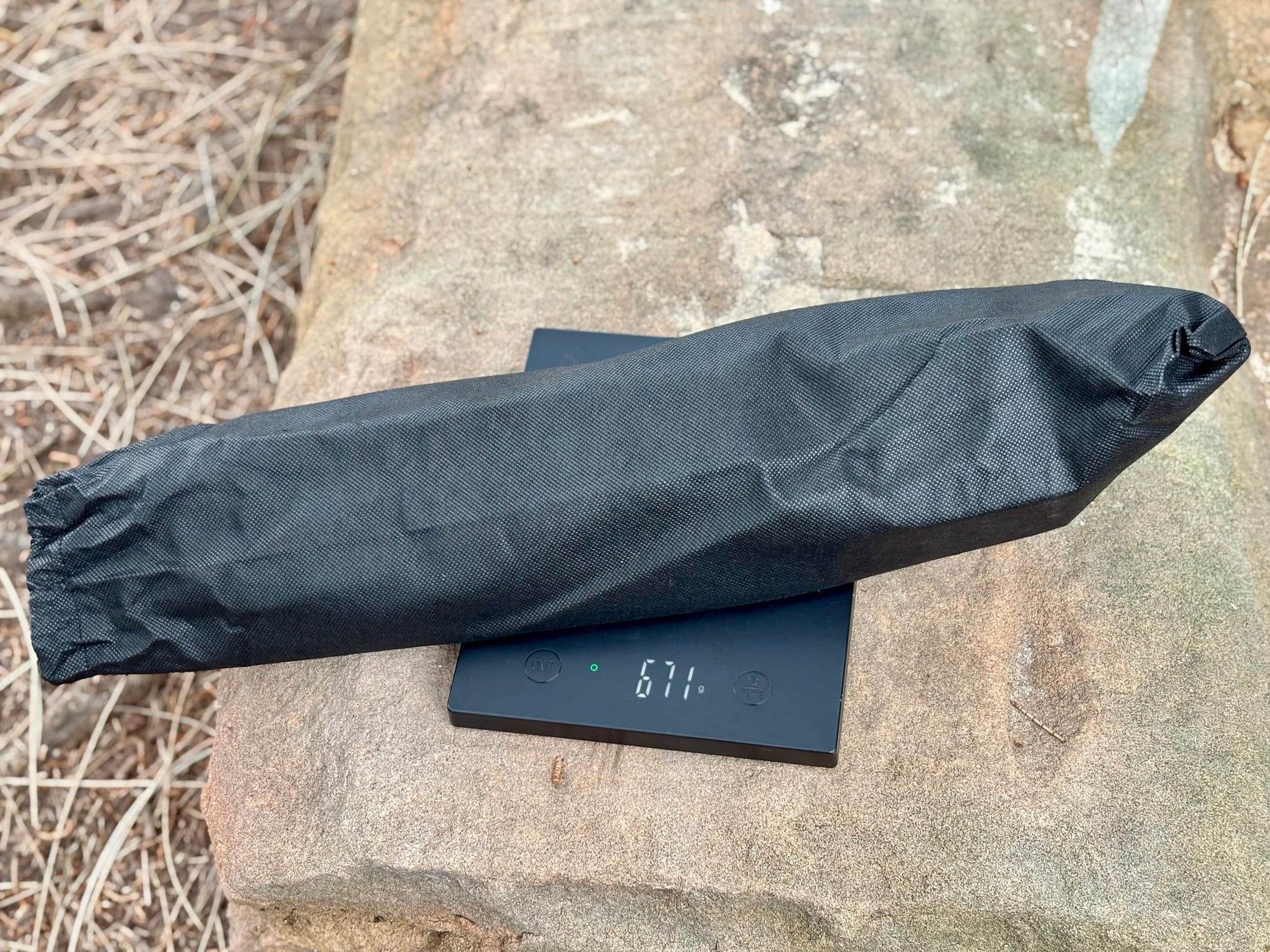The Kings BBQ Tool Set in its pouch on the scale