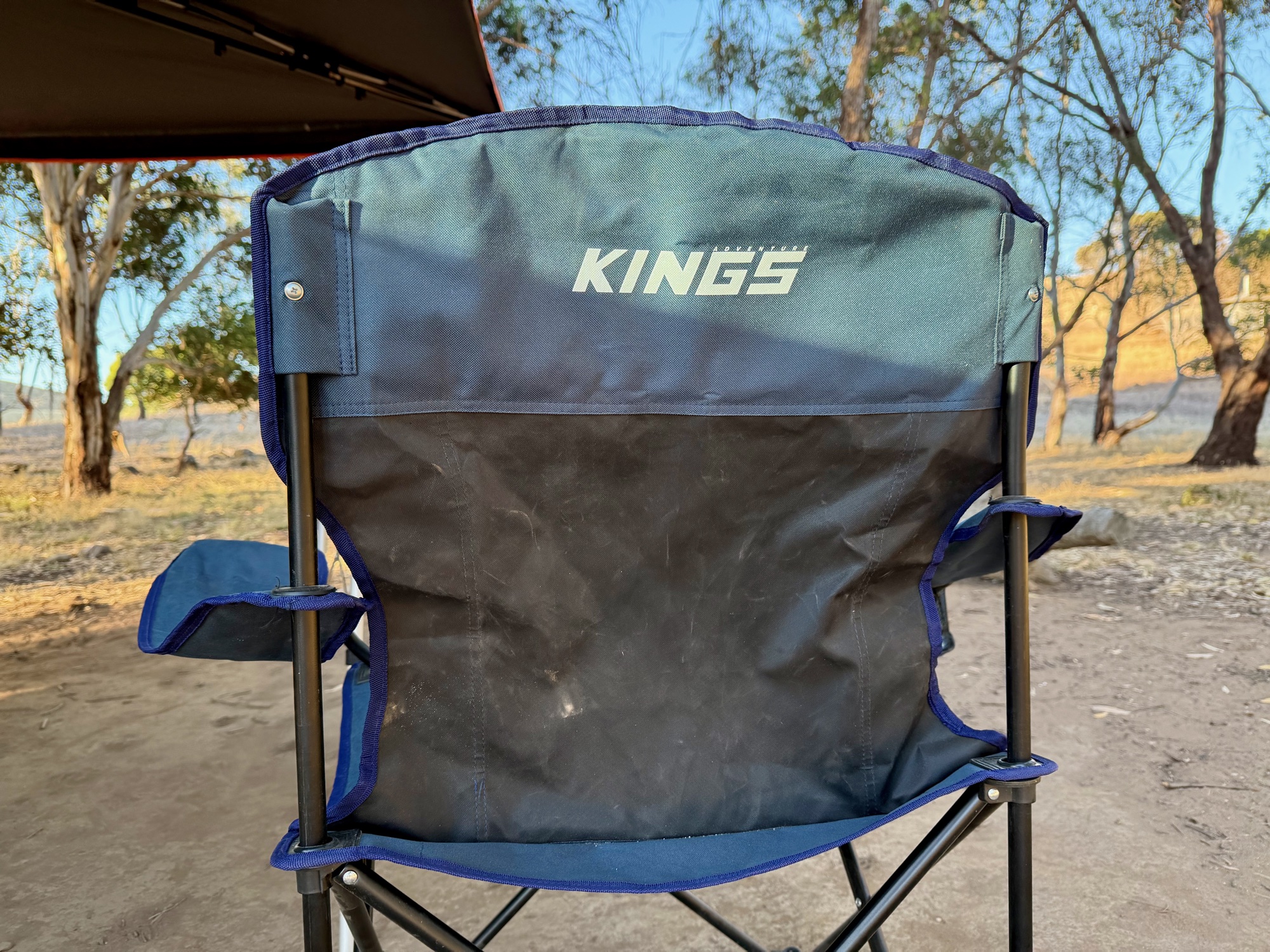 The back of the Kings Essential chair, with the screws that hold the fabric sleeves to the frame