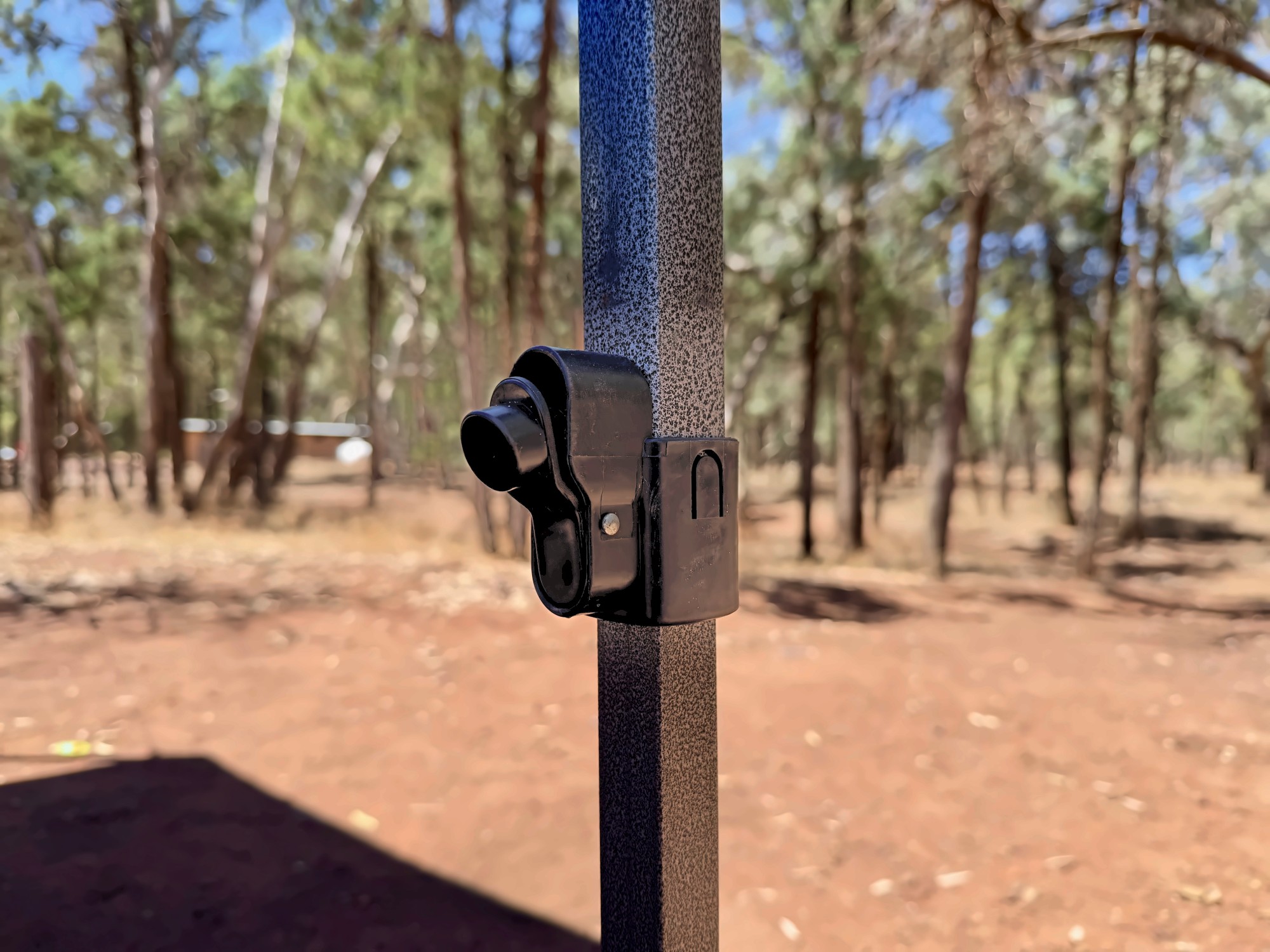 The pin-lock height clip on a leg of the Kings gazebo