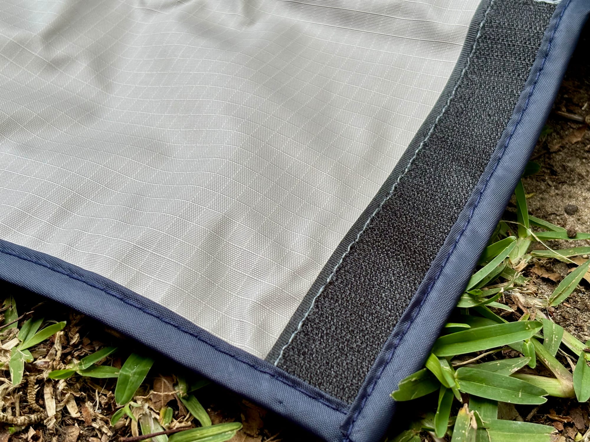 Close-up of the black Velcro strip along the edge of the pocket’s back
