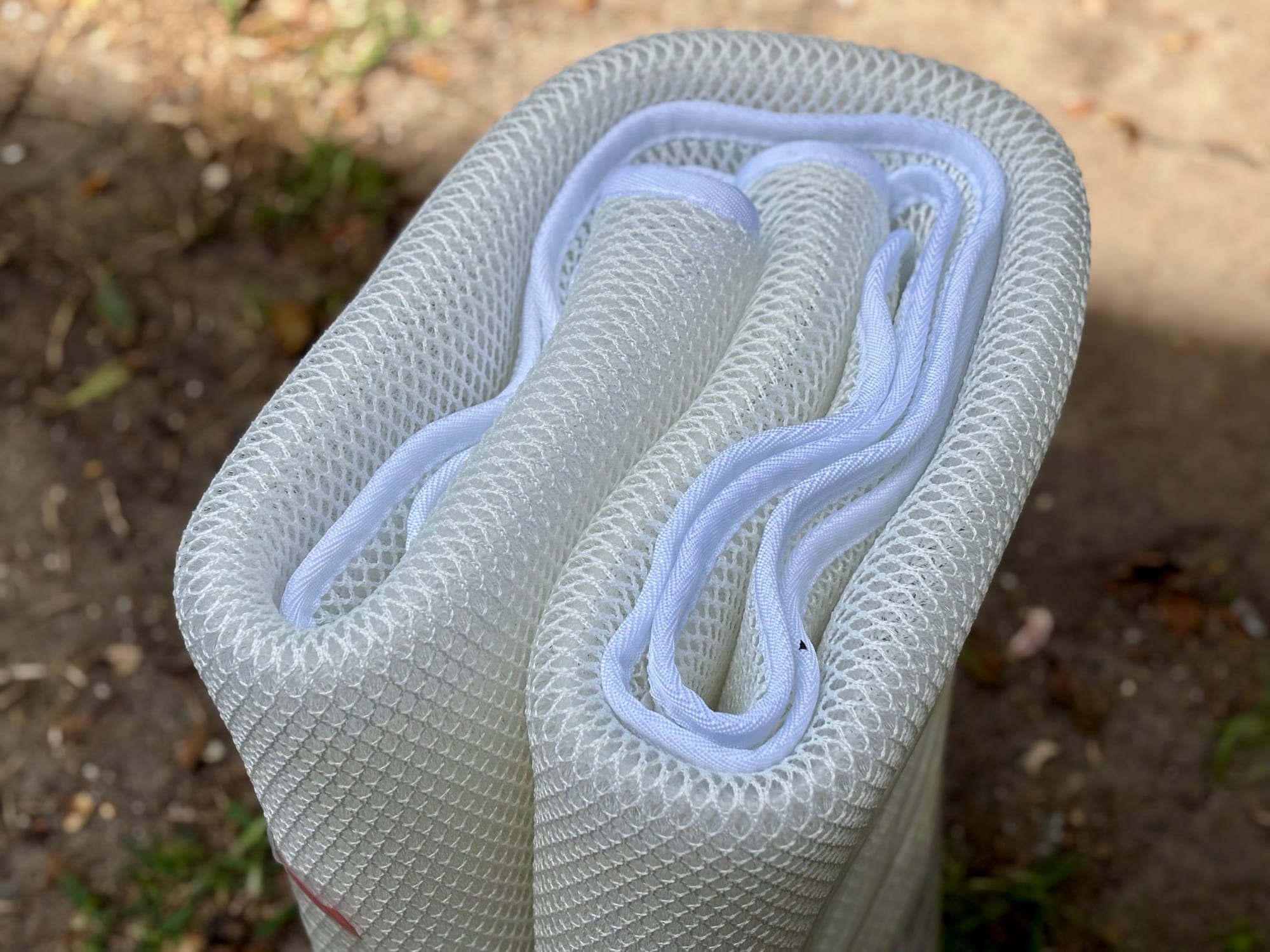 The rolled-up Kings anti-condensation mat showing the white 3D mesh
