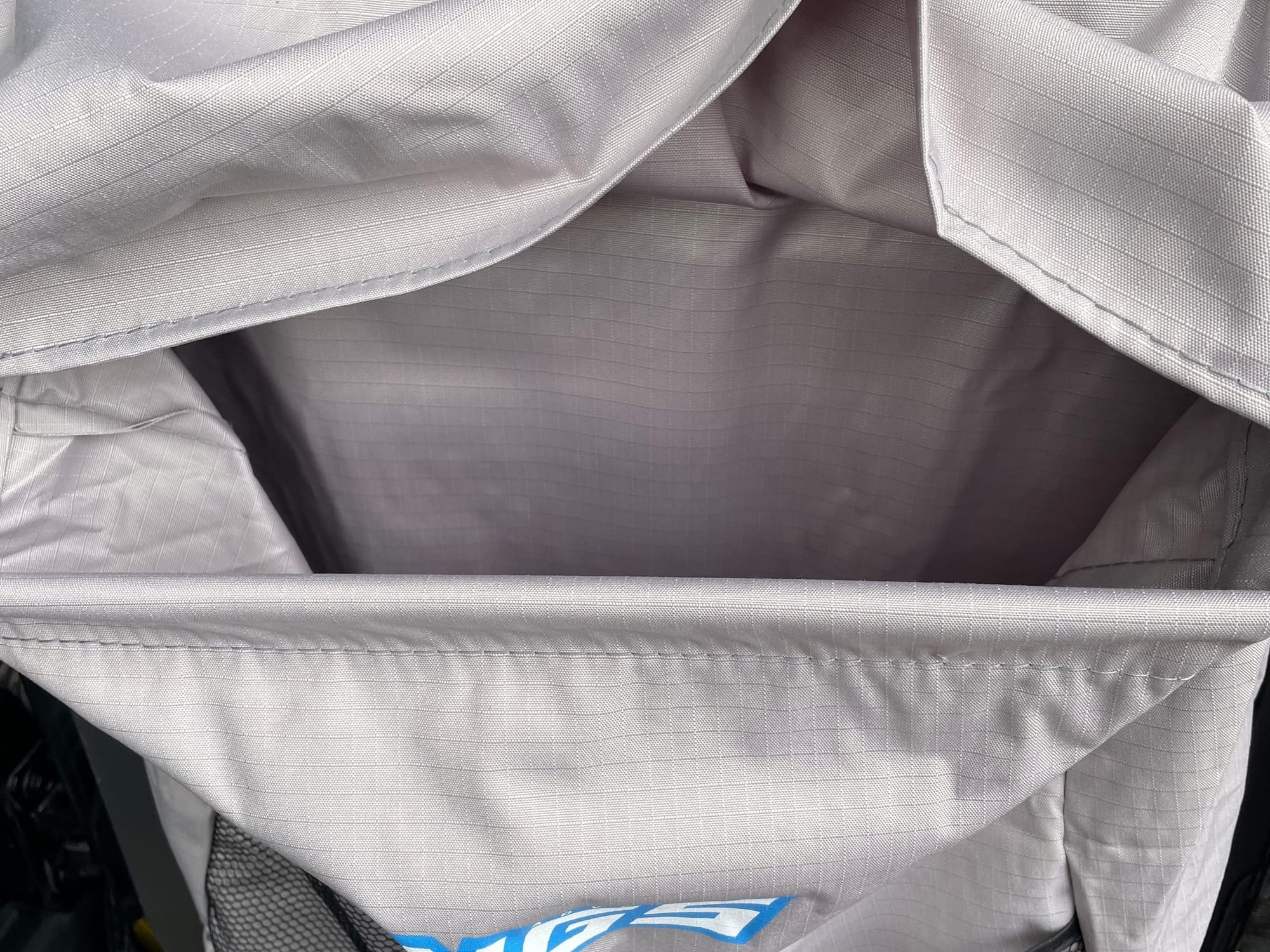 Looking into the main pocket of the Kings Universal Storage Bag under its fold-over top