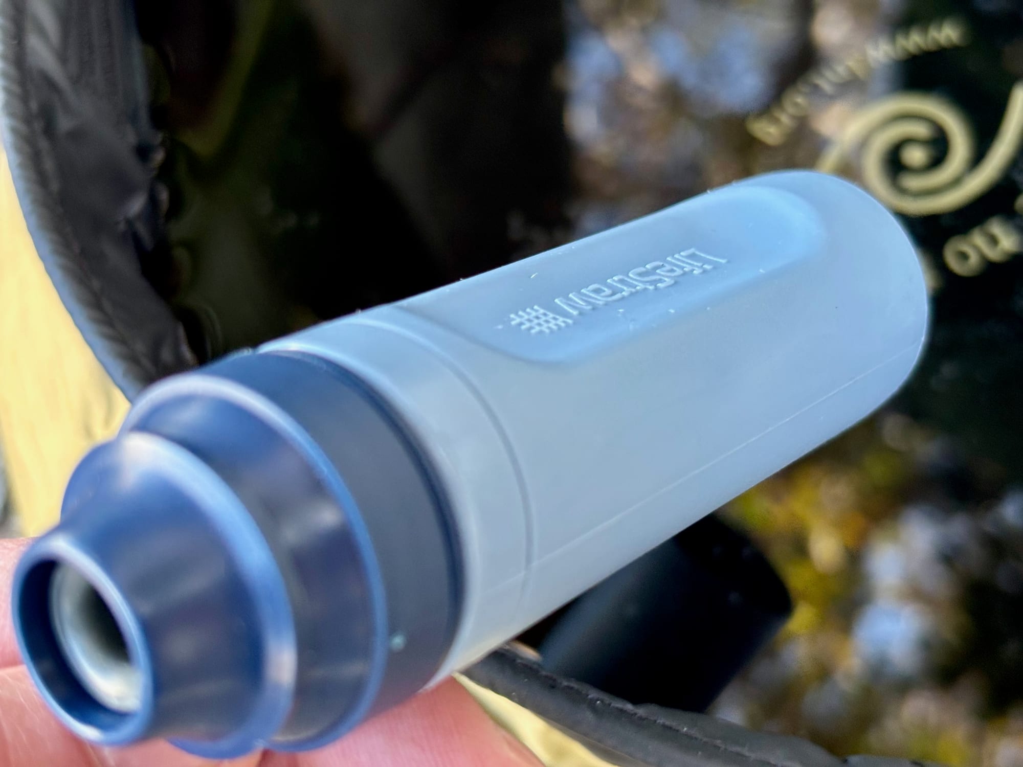 Close-up of the Peak Solo’s mouthpiece end, held low over the ground