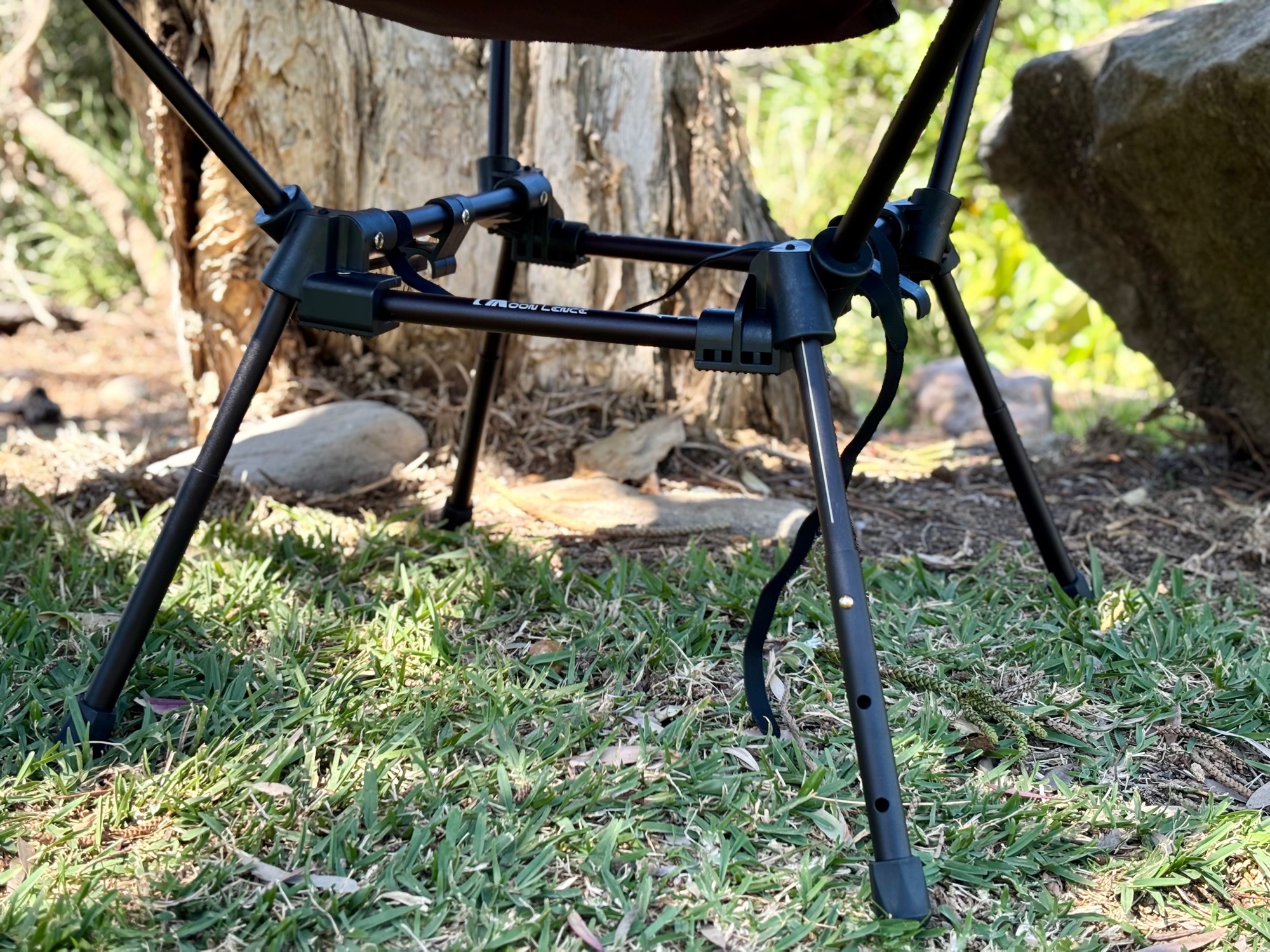 The Moon Lence frame under the seat, with the square base and four legs