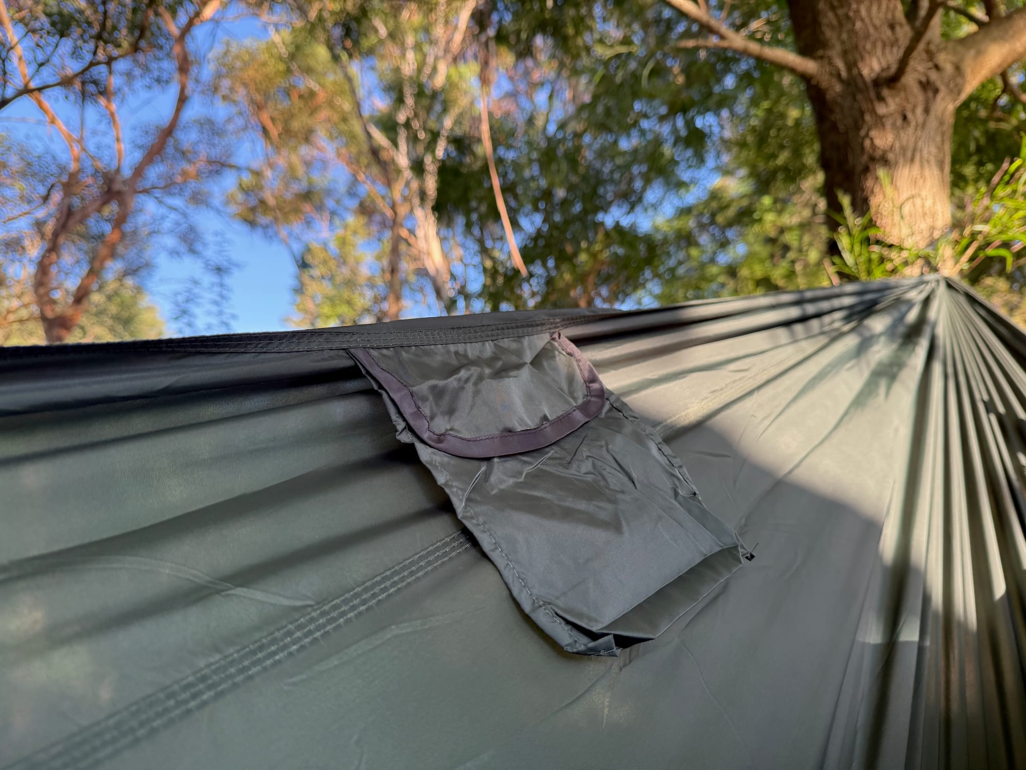 The accessories pocket with its Velcro flap on the inside edge of the Mountain Designs hammock