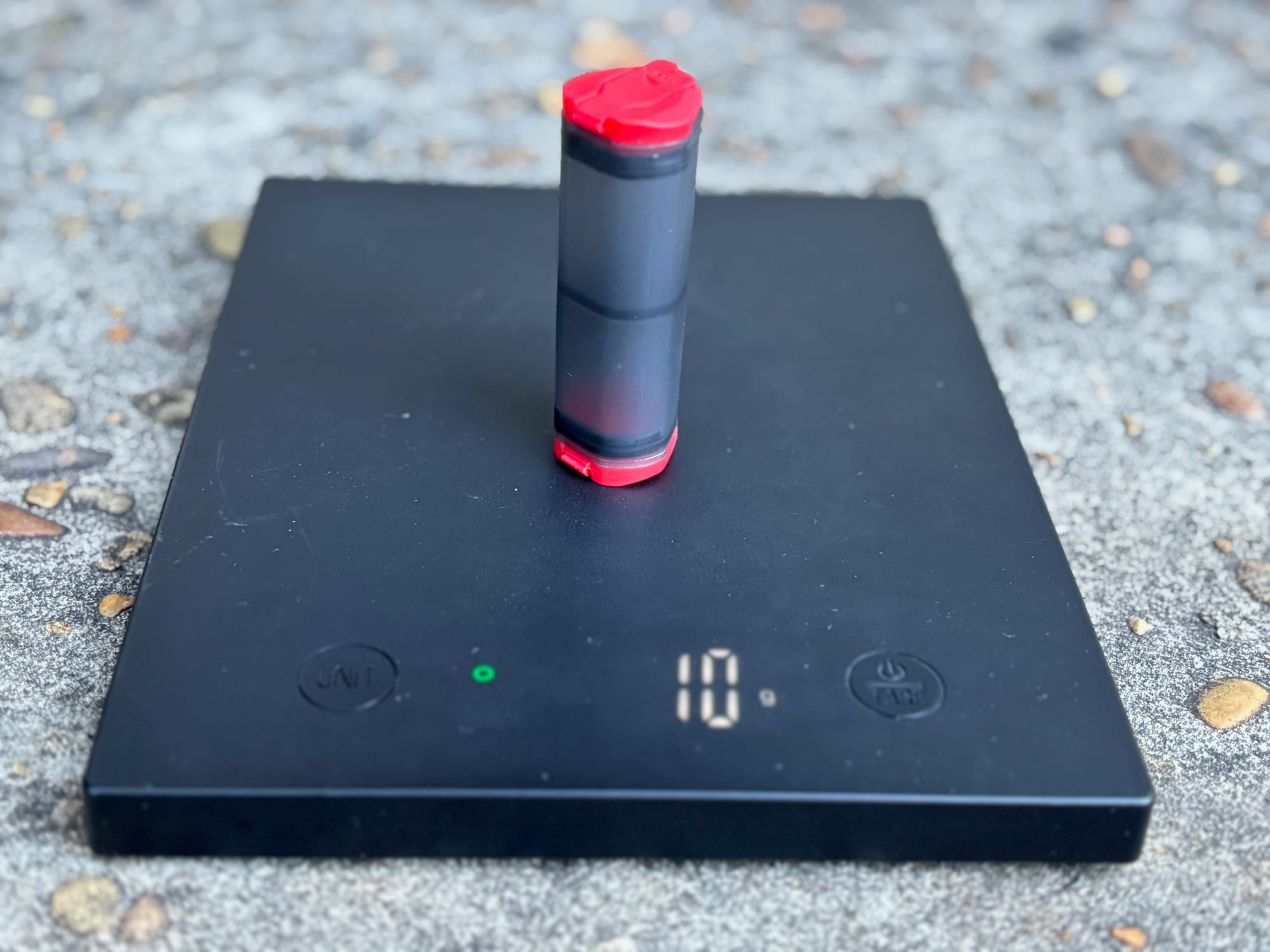 The MSR shaker on a digital scale showing 10 grams