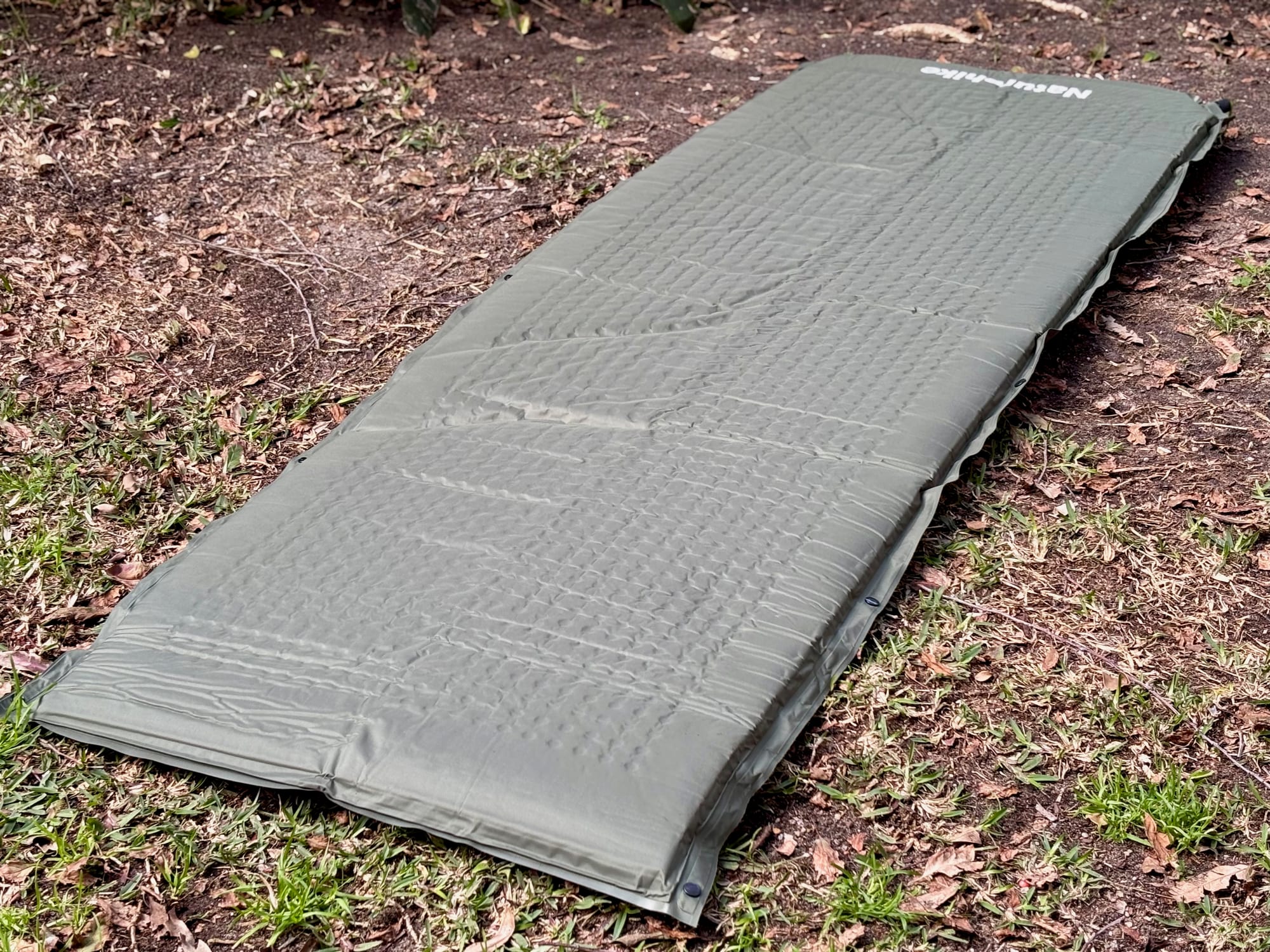 The Naturehike D-Series self-inflating sleeping pad laid out at full length