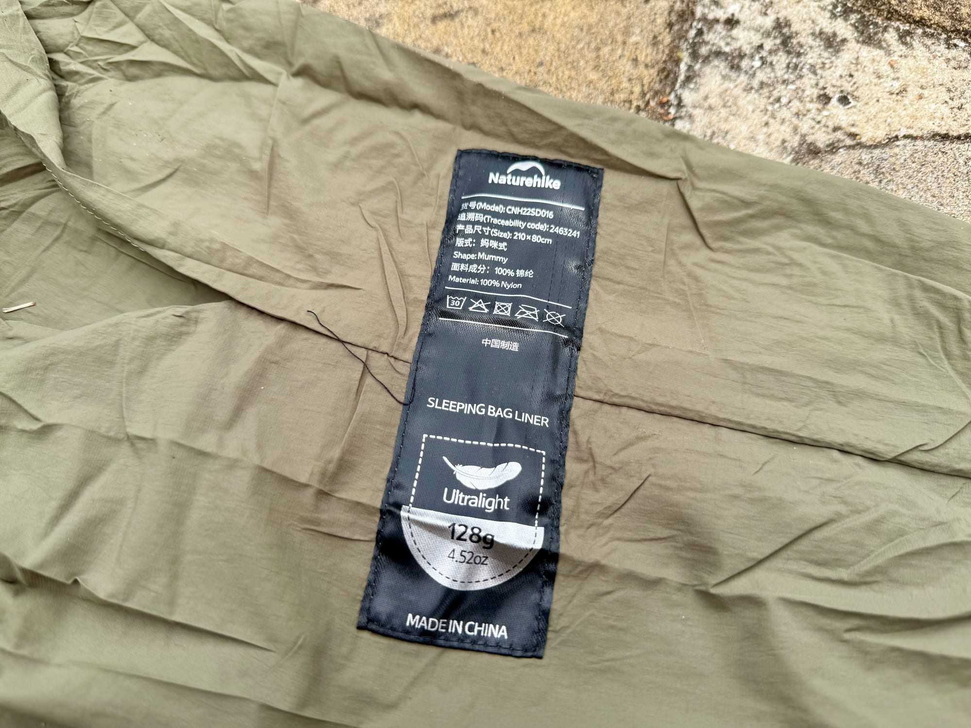 The label sewn into the Naturehike liner: ultralight, 128 g